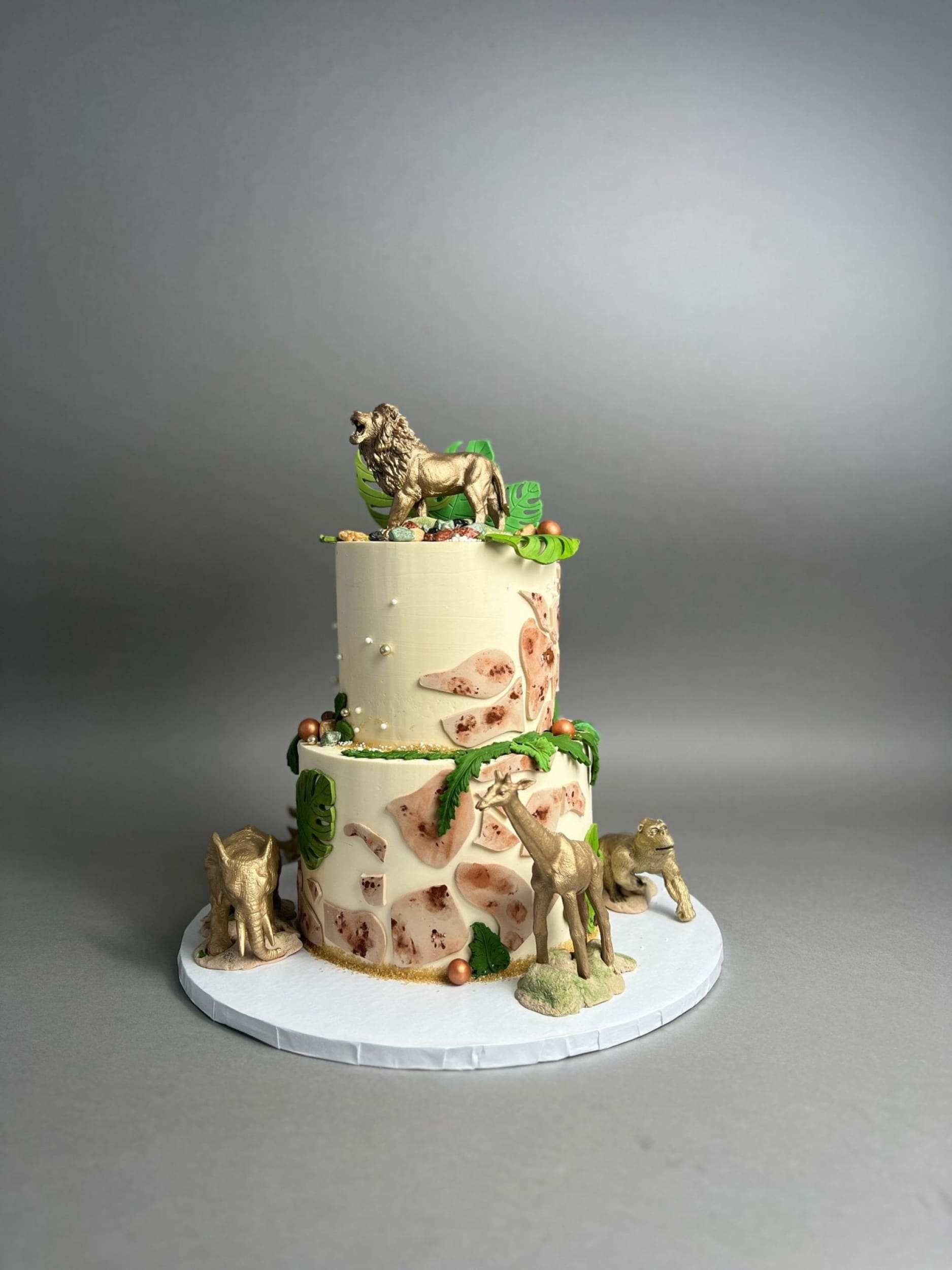 Golden safari animals on buttercream - custom cake