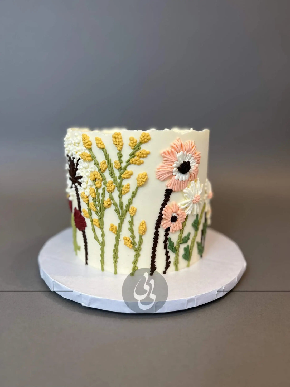 Hand piped embroidery on buttercream - custom cake