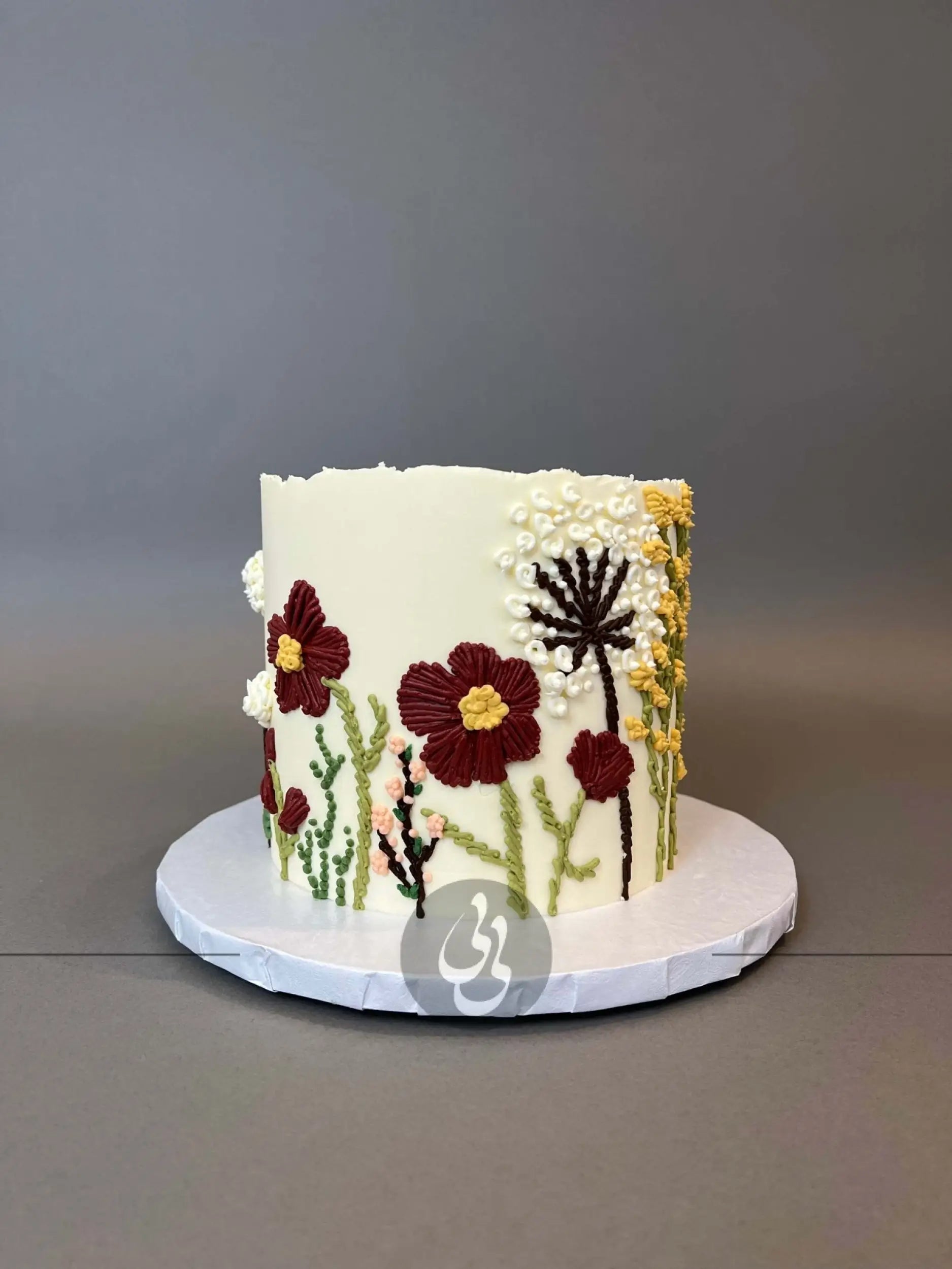 Hand piped embroidery on buttercream - custom cake