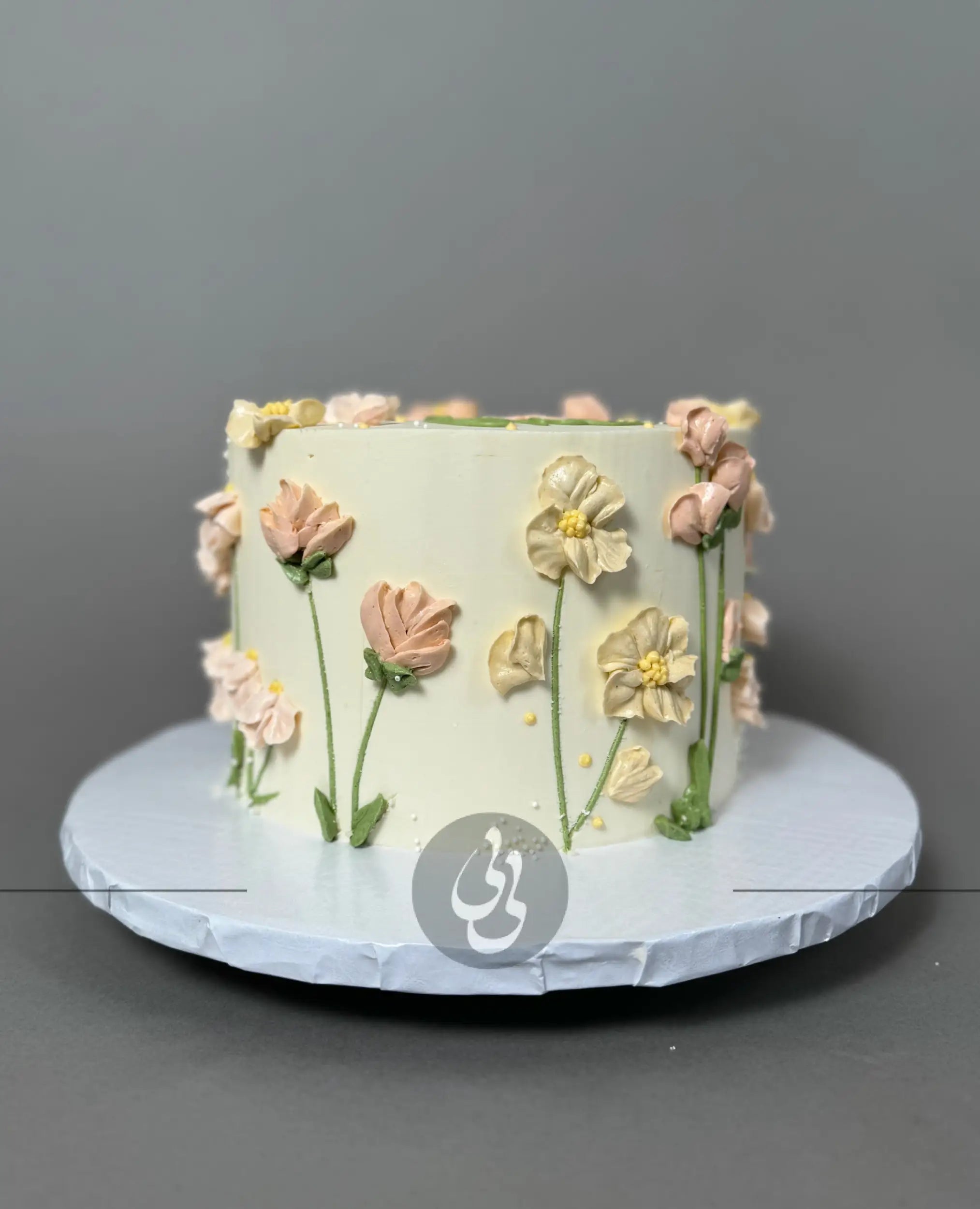 Hand piped flower meadow - custom cake
