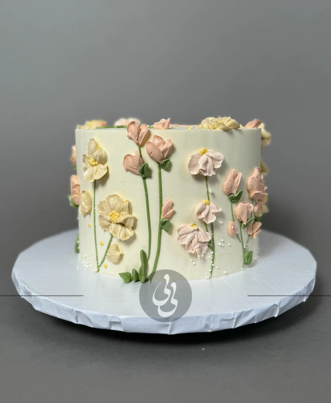 Hand piped flower meadow - custom cake