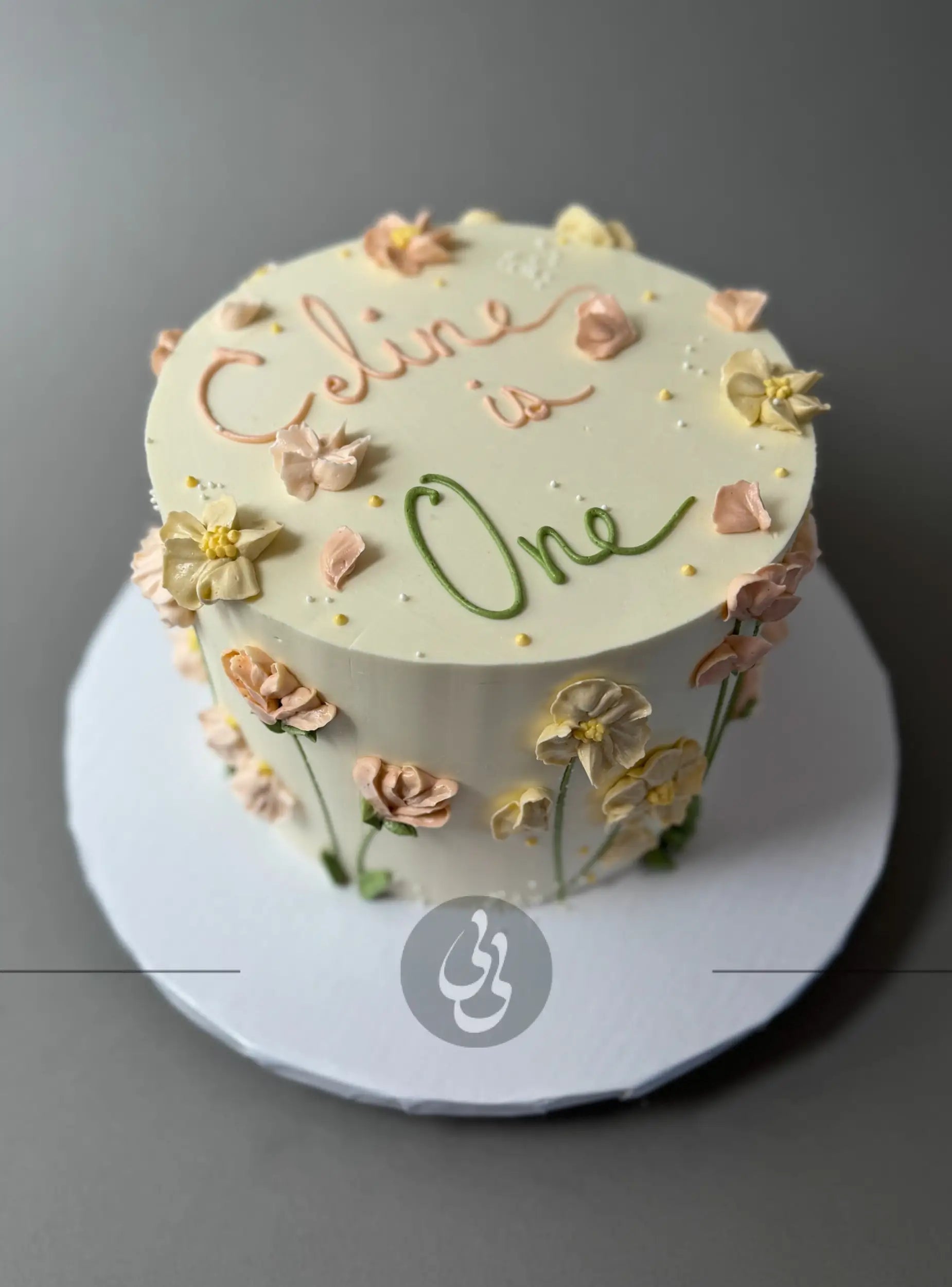 Hand piped flower meadow - custom cake