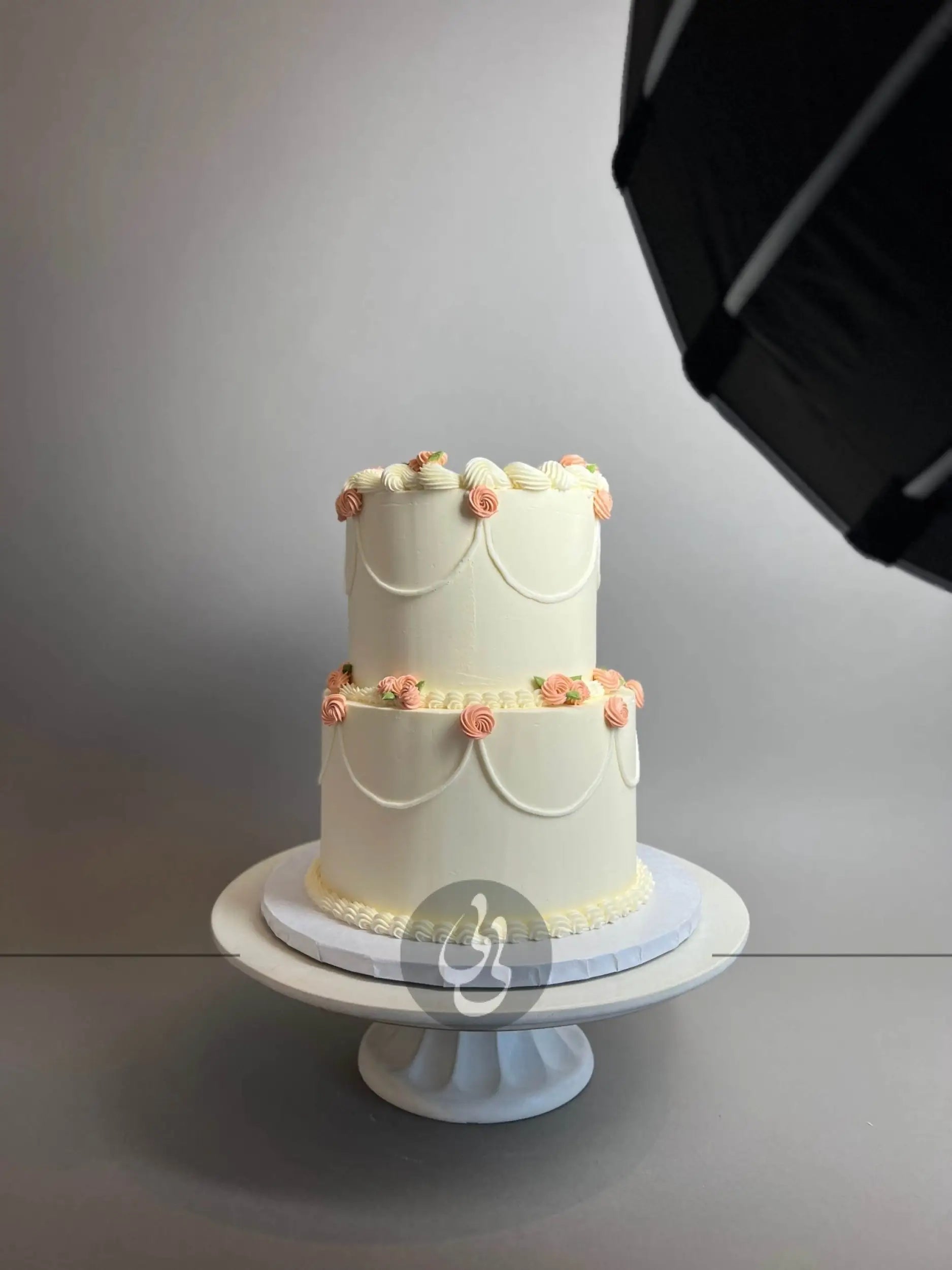 Hand piped mini rosettes on buttercream - custom cake