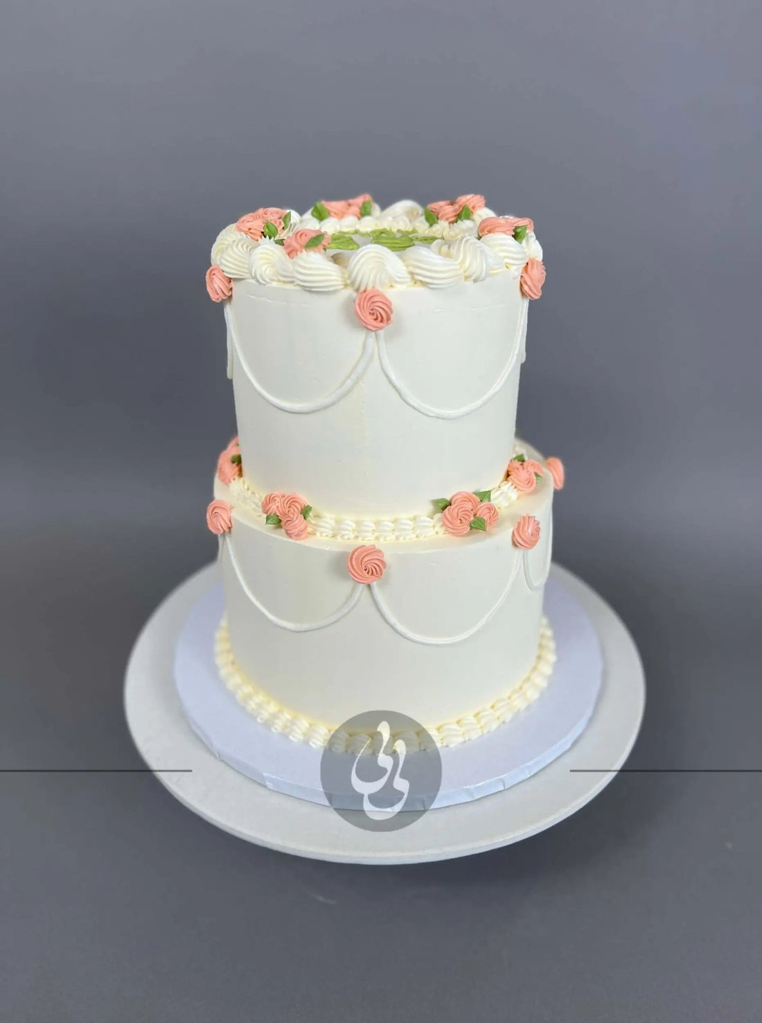 Hand piped mini rosettes on buttercream - custom cake