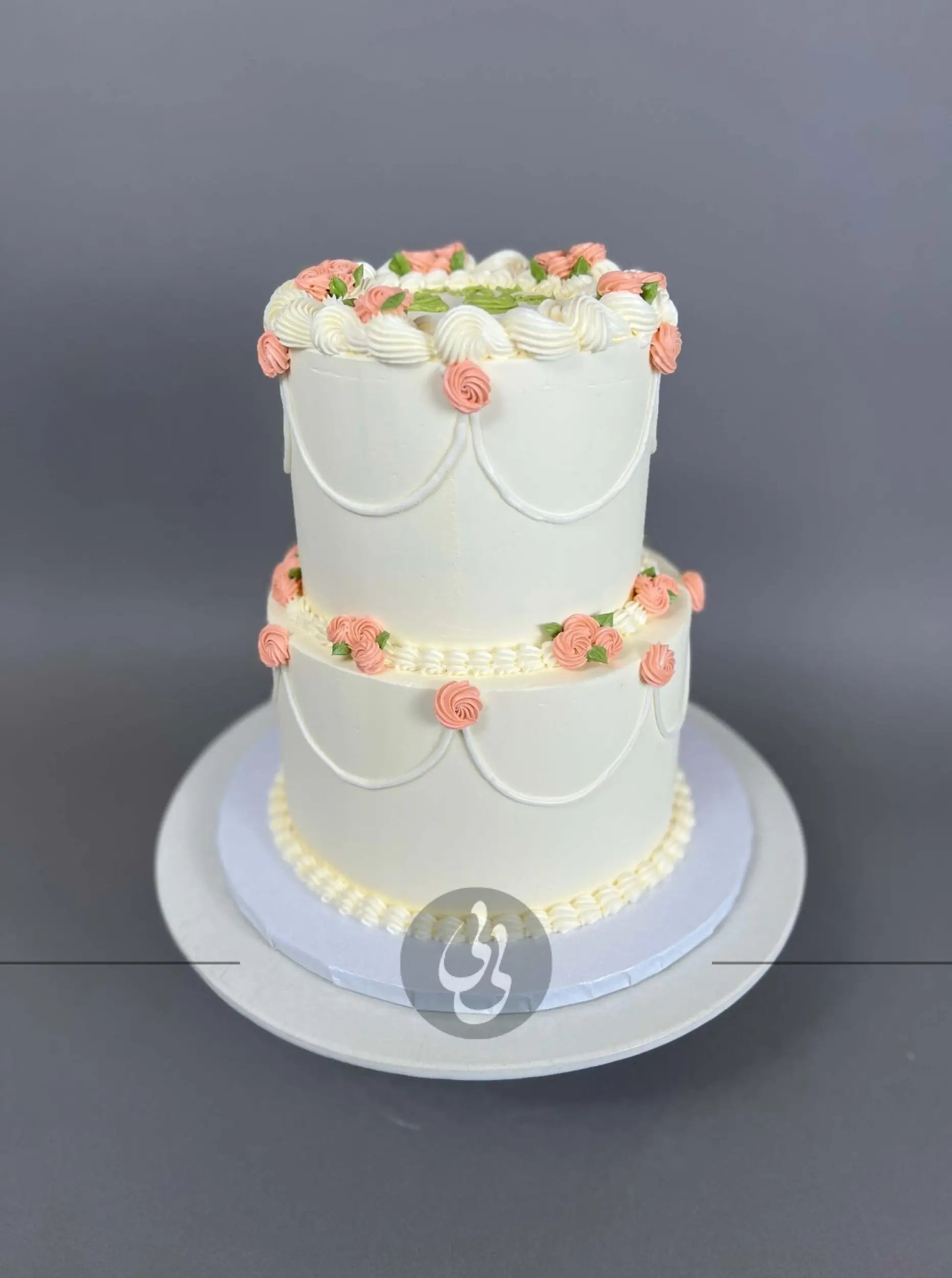 Hand piped mini rosettes on buttercream - custom cake
