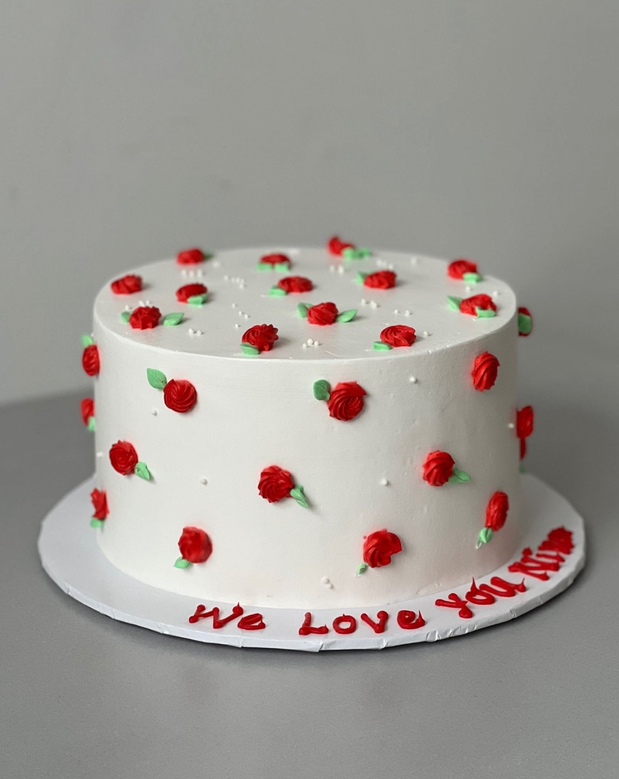 Hand piped mini rosettes on whipped cream - custom cake