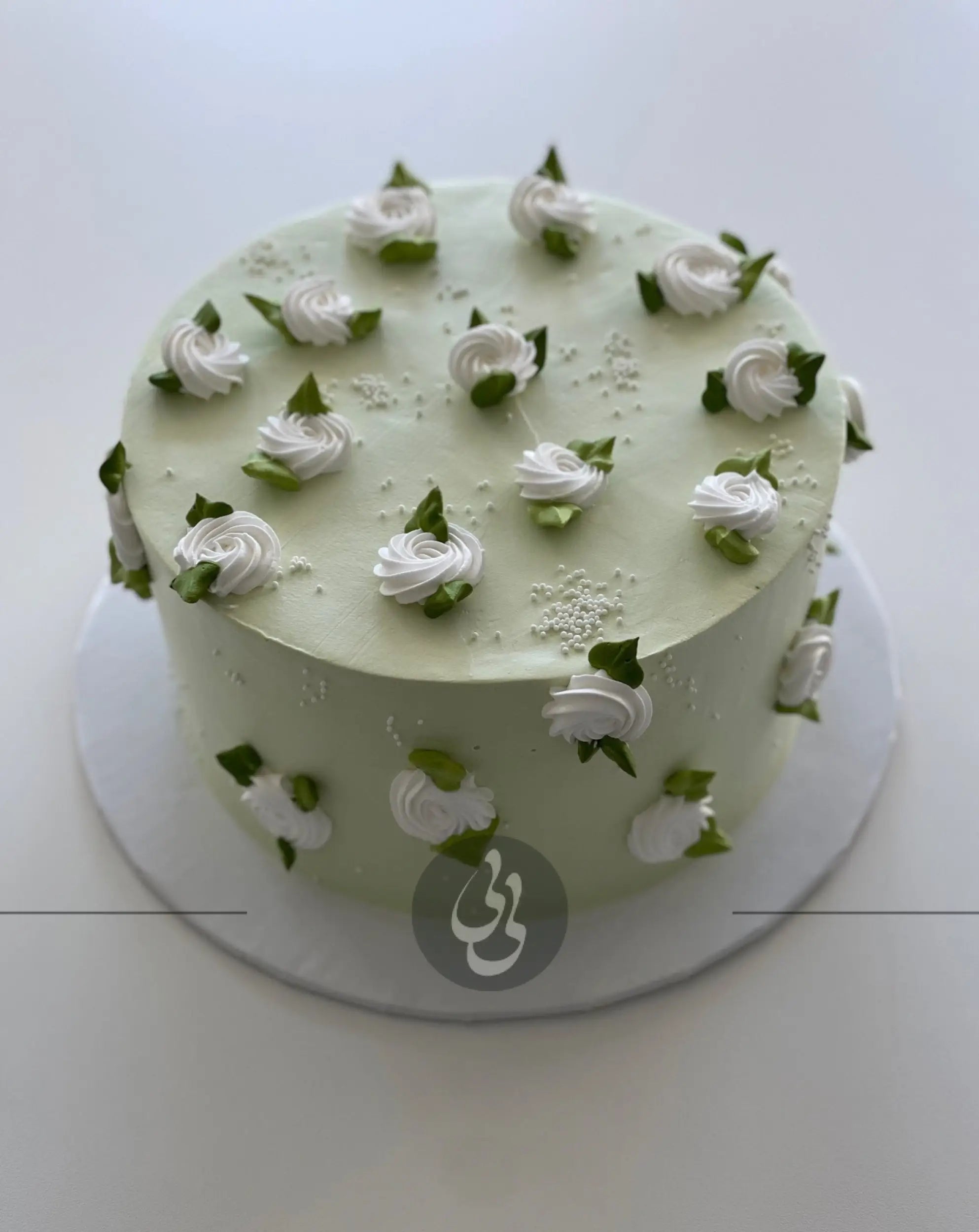 Hand piped mini rosettes on whipped cream - custom cake