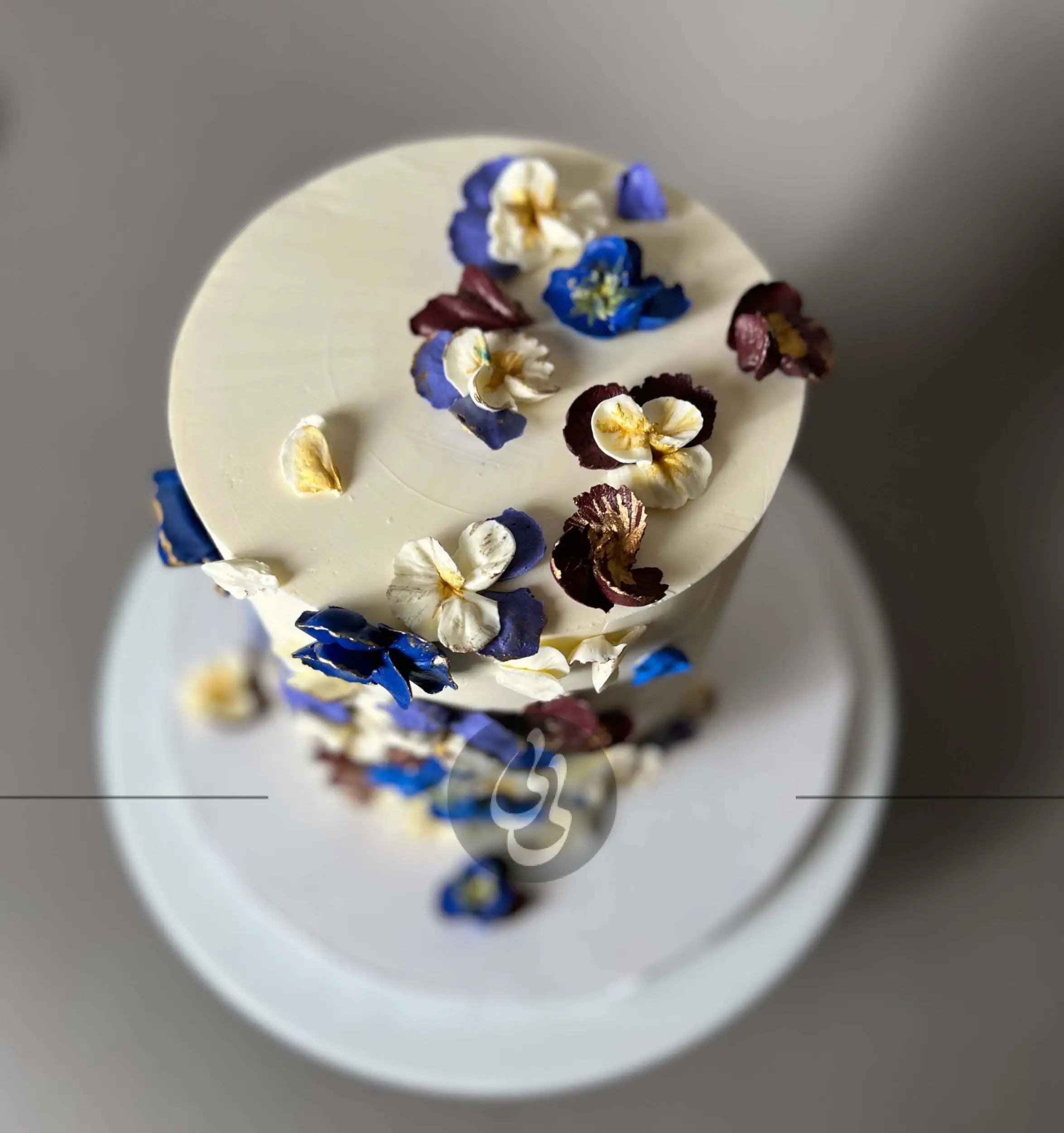 Hand piped pansy flowers on buttercream - custom cake