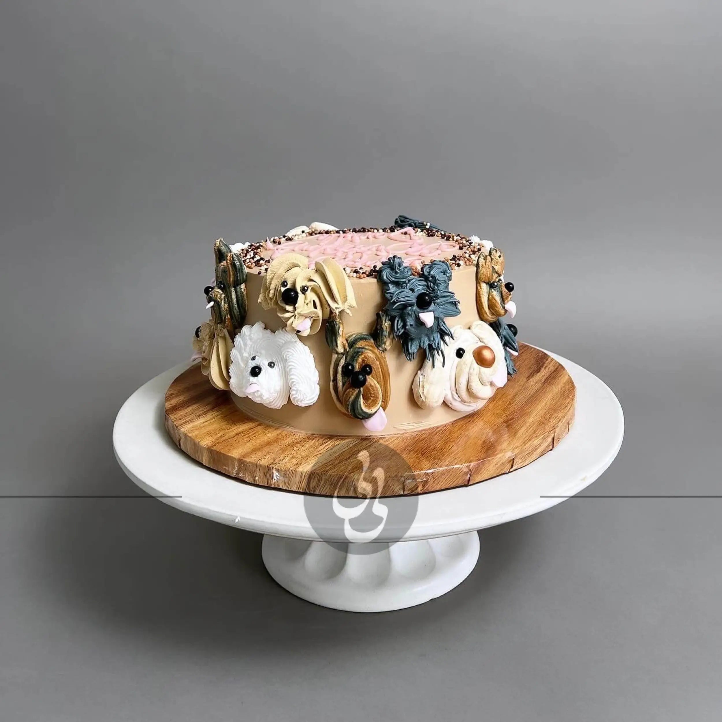 Hand piped puppy party on whipped cream - custom cake