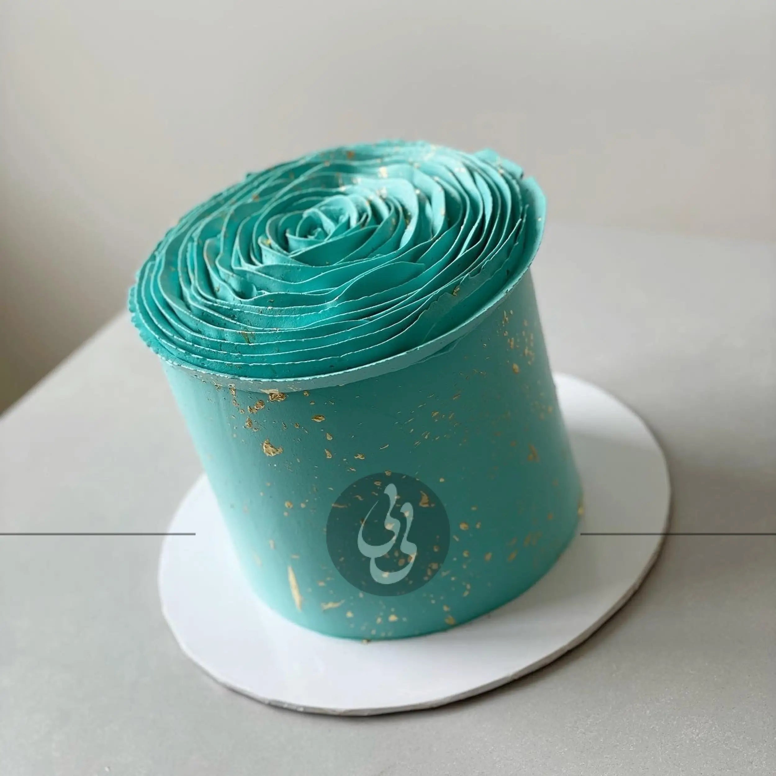 Hand piped ruffled rose on buttercream - custom cake