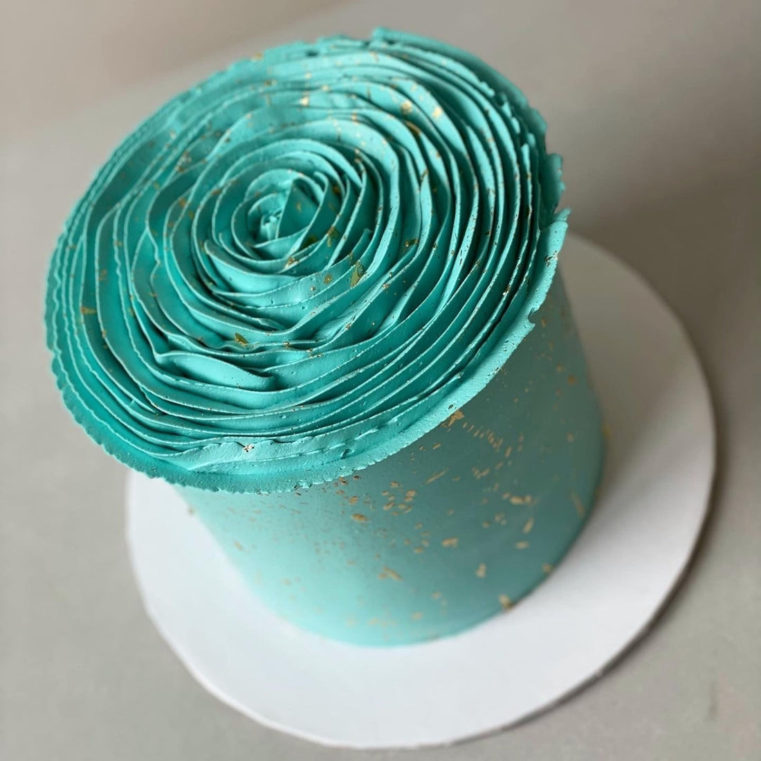 Hand piped ruffled rose on buttercream - custom cake