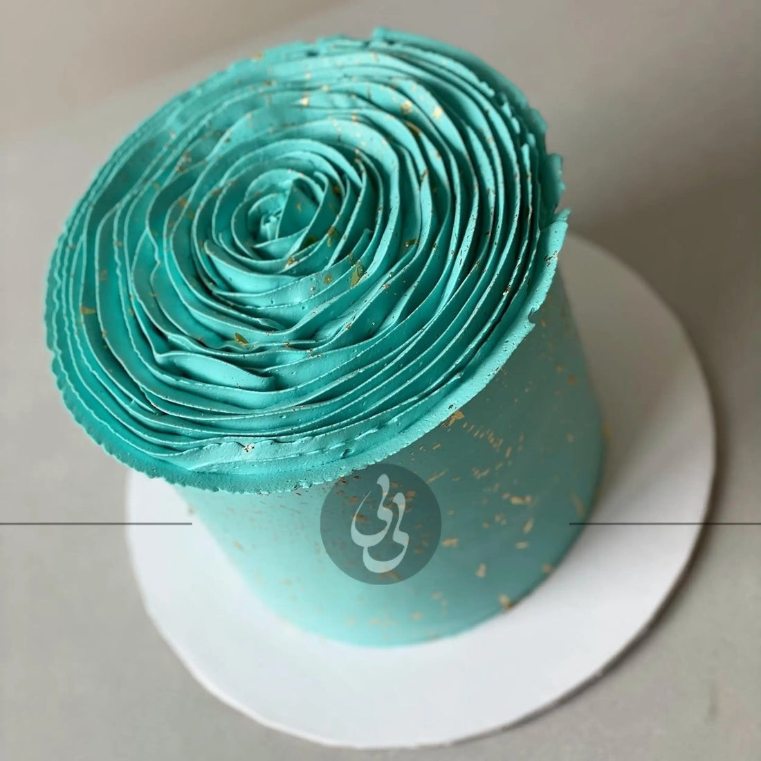Hand piped ruffled rose on buttercream - custom cake