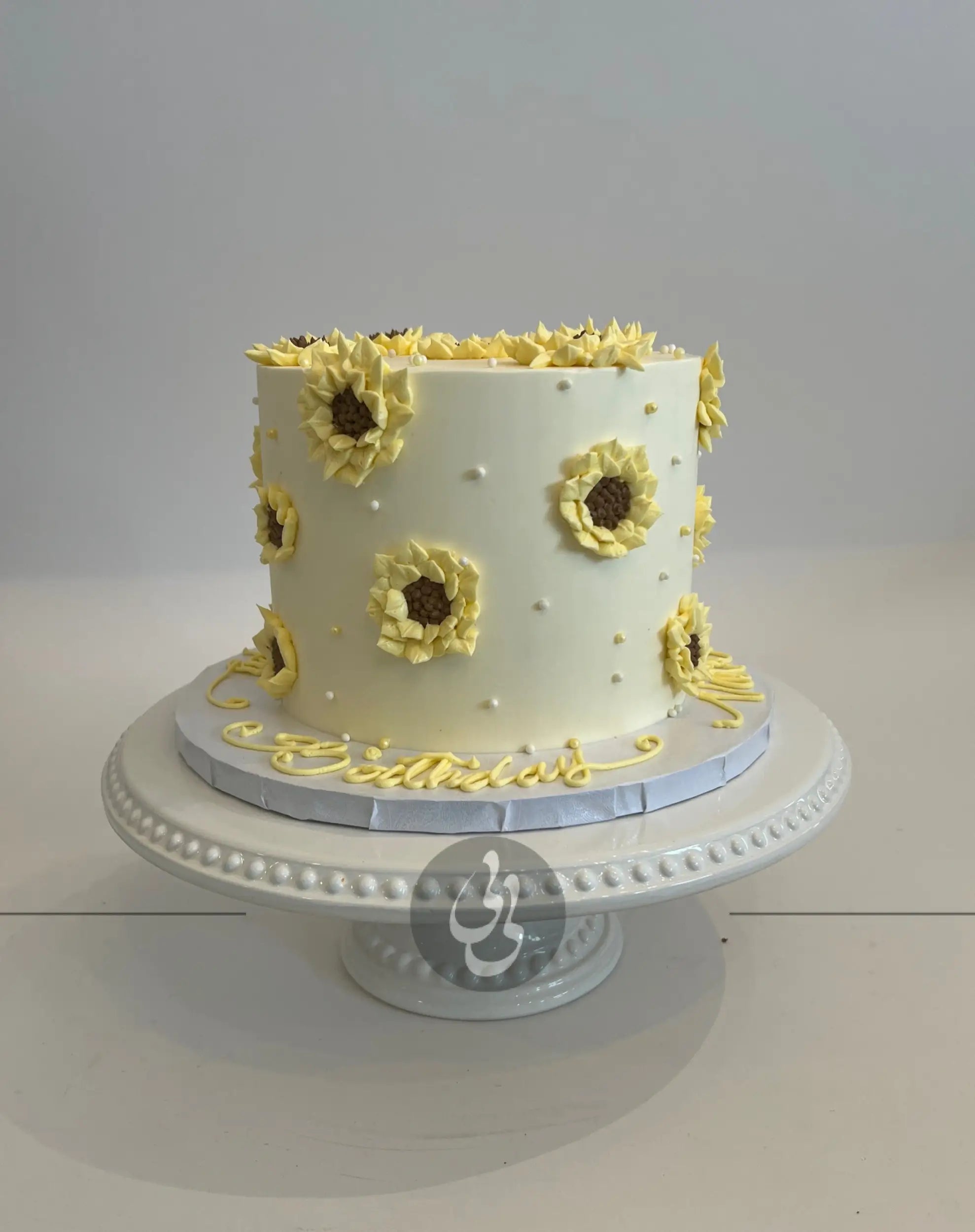 Hand piped sunflowers on buttercream - custom cake
