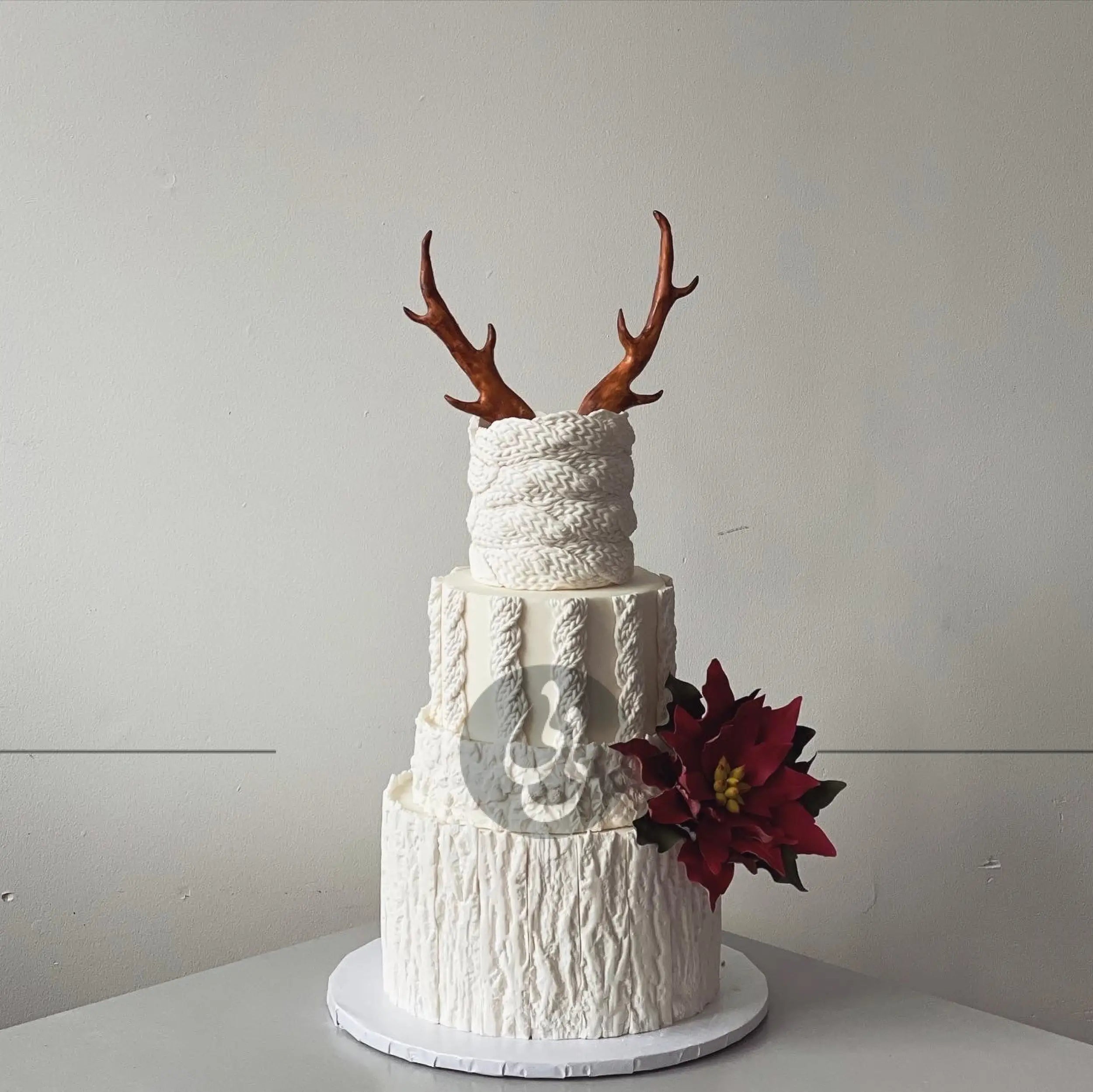Knit & antlers holiday cake - wedding cake