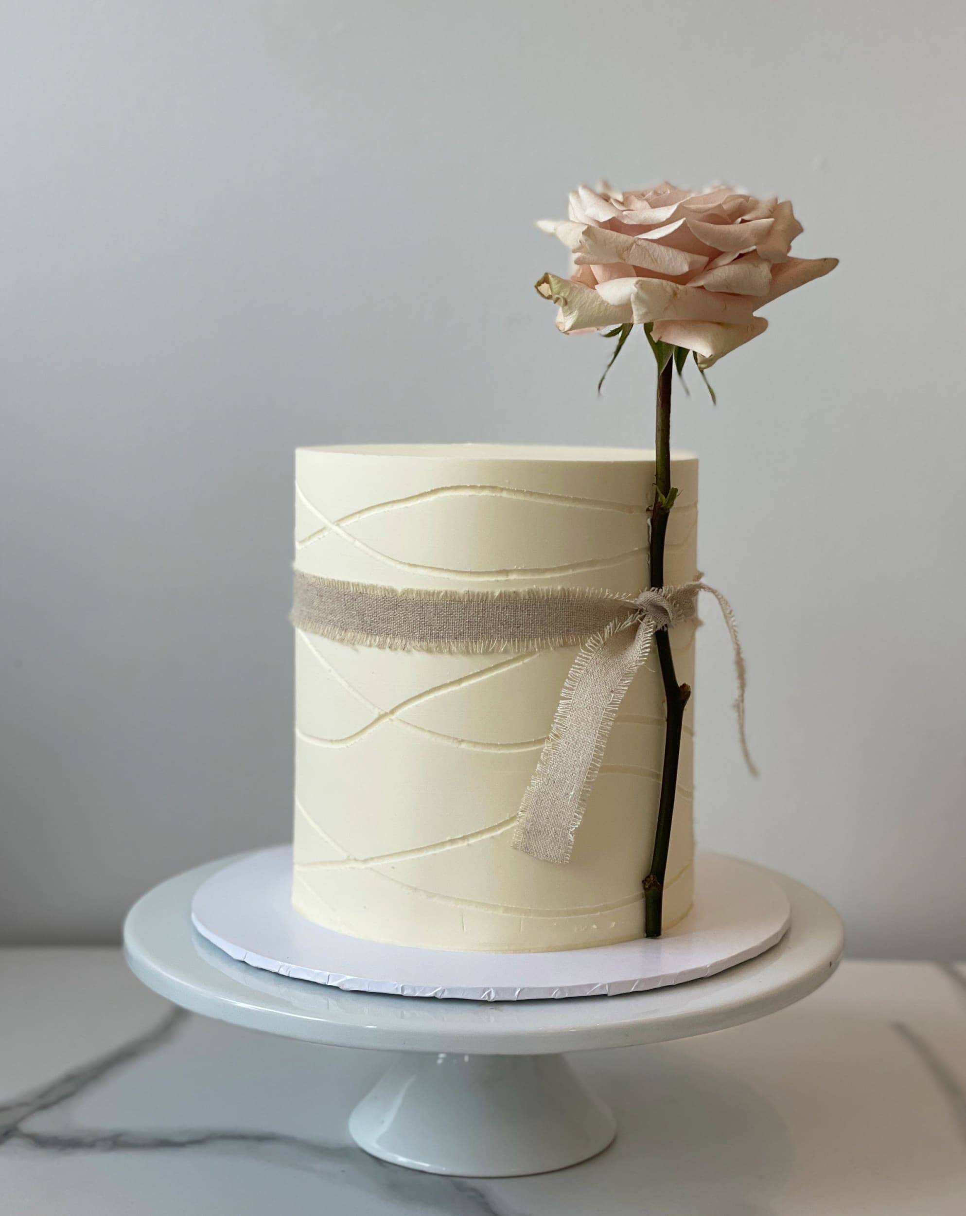 Long stem rose on buttercream - custom cake