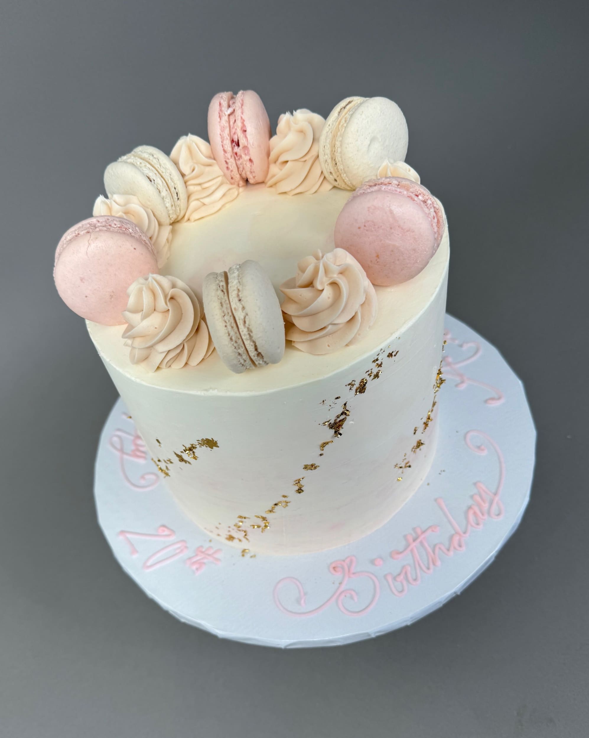 Macarons & gold foil on marble buttercream - custom cake