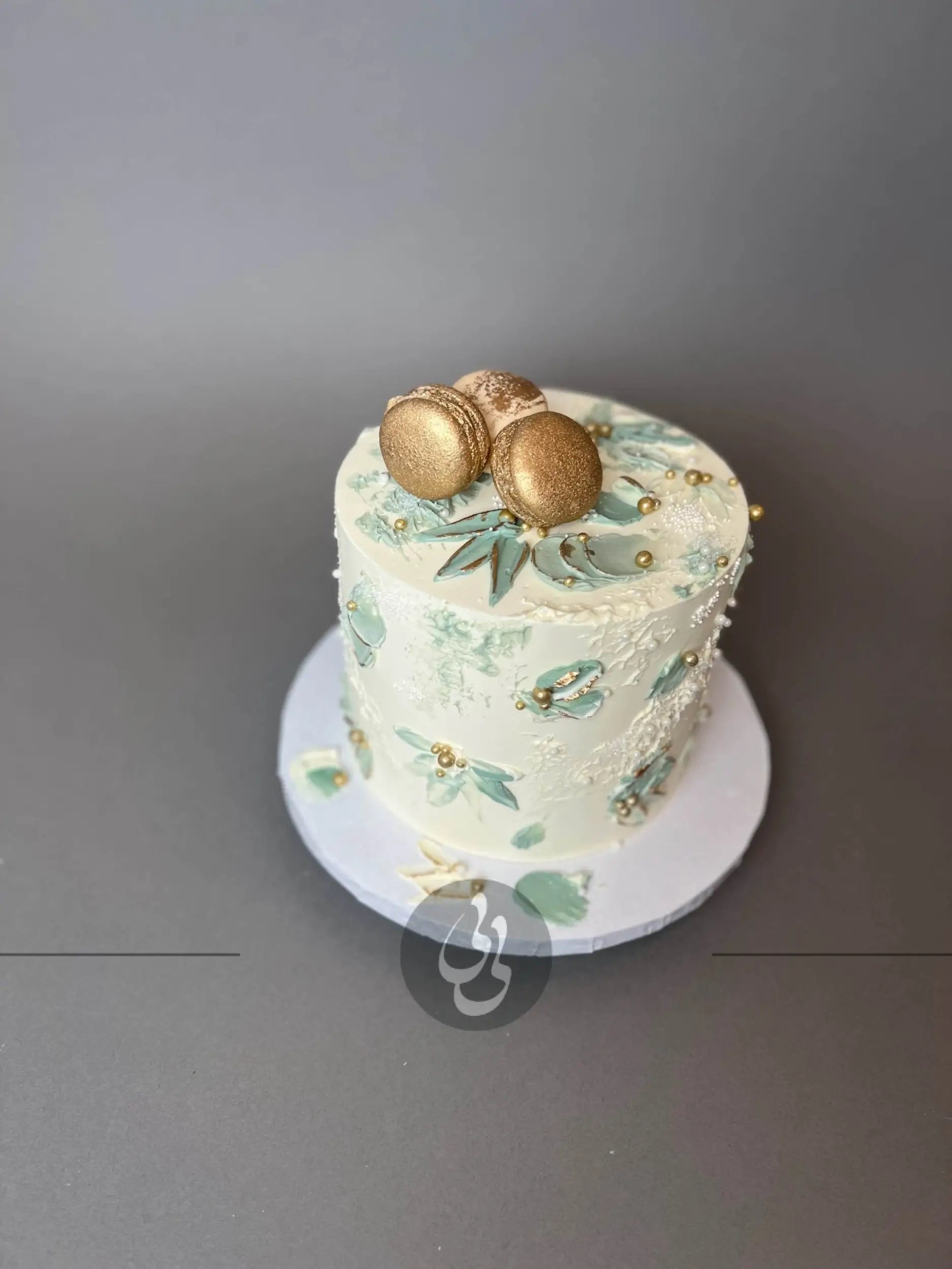 Macarons on pallet knife buttercream - custom cake