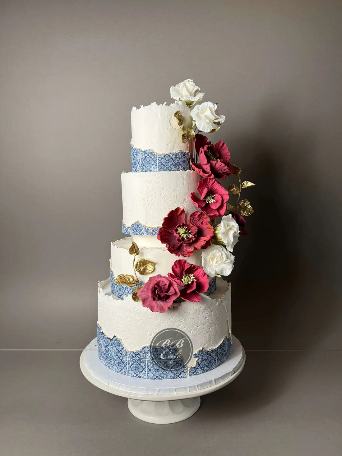 Mediterranean tiles &amp; sugar flowers - wedding cake