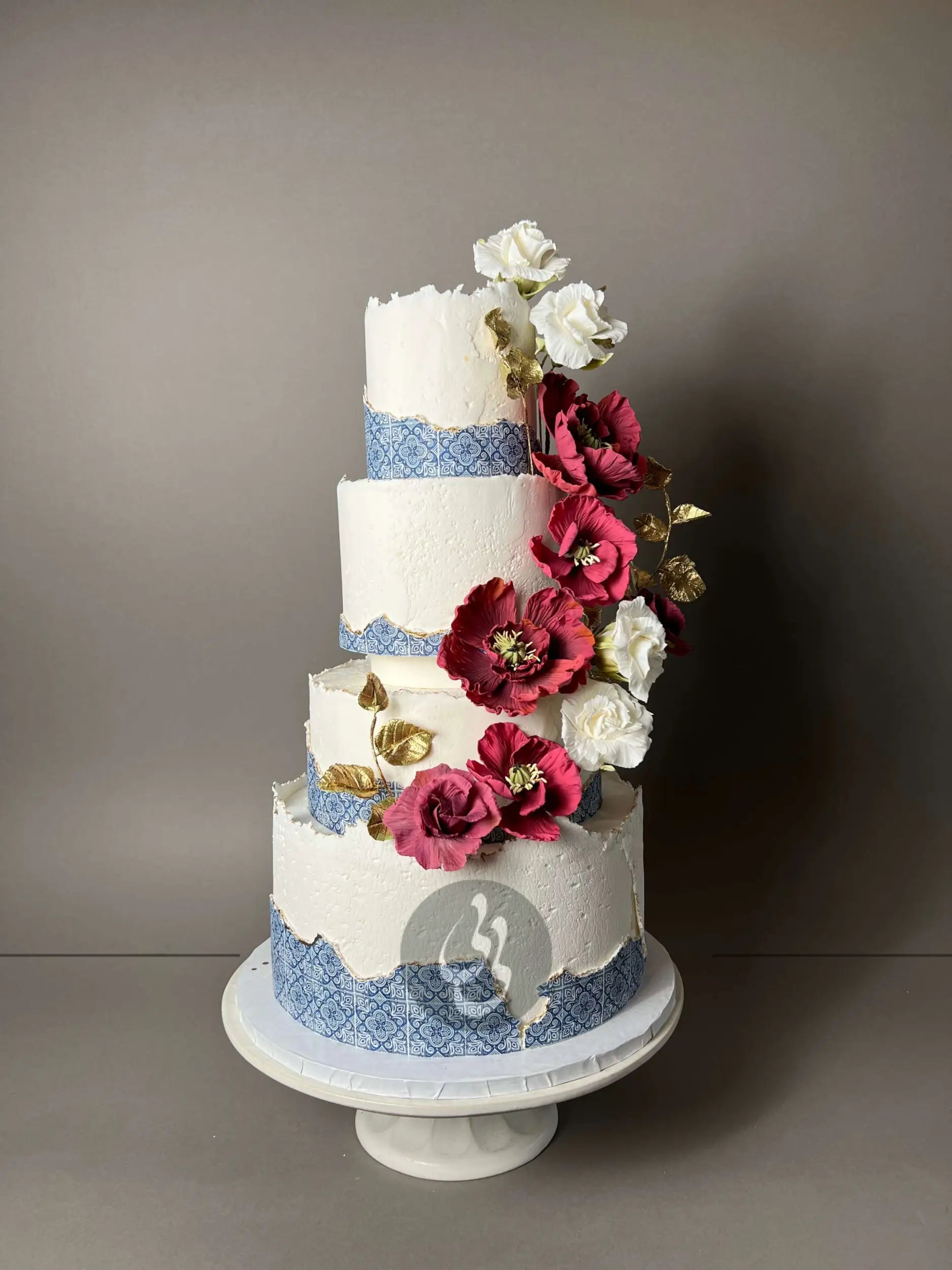 Mediterranean tiles & sugar flowers - wedding cake