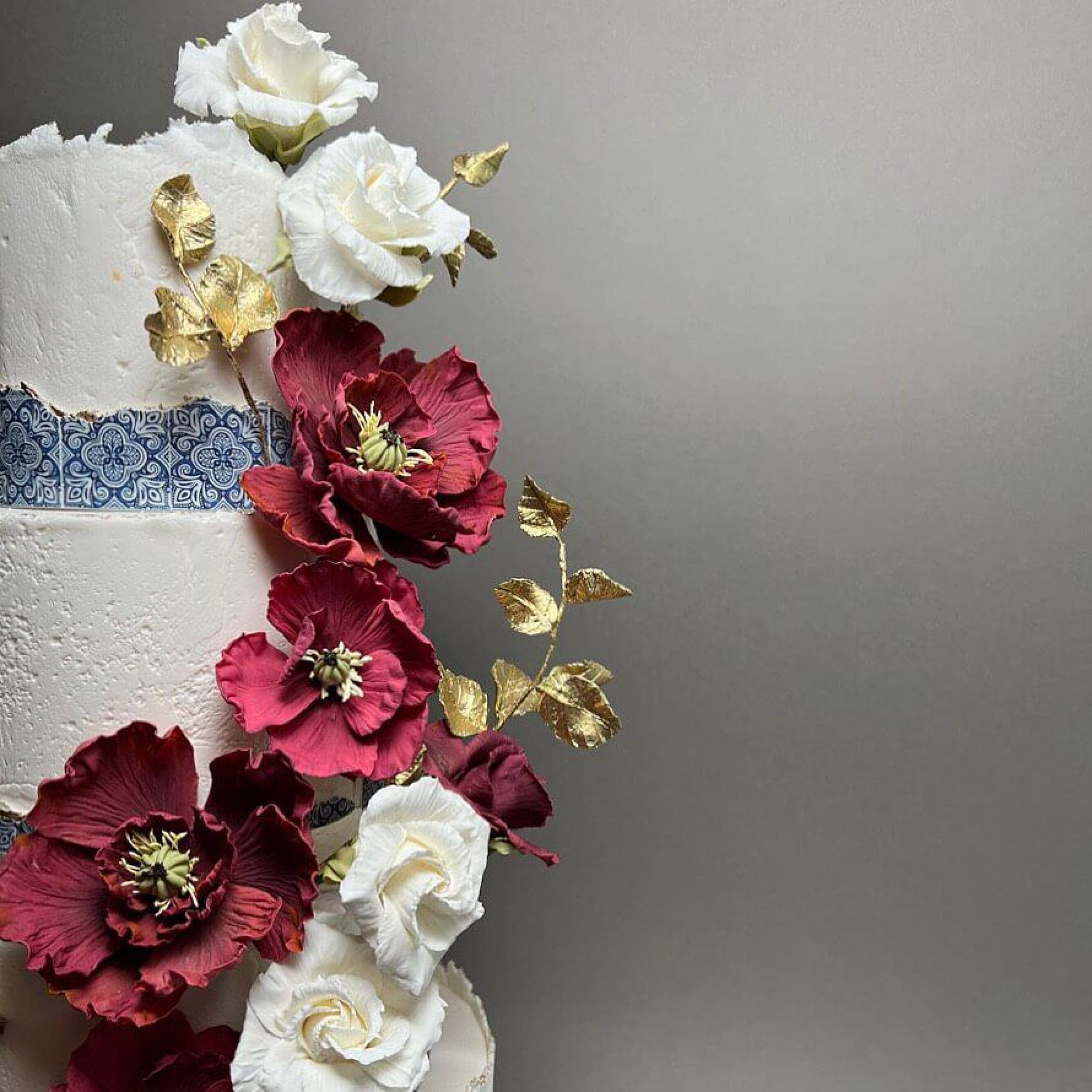 Mediterranean tiles & sugar flowers - wedding cake