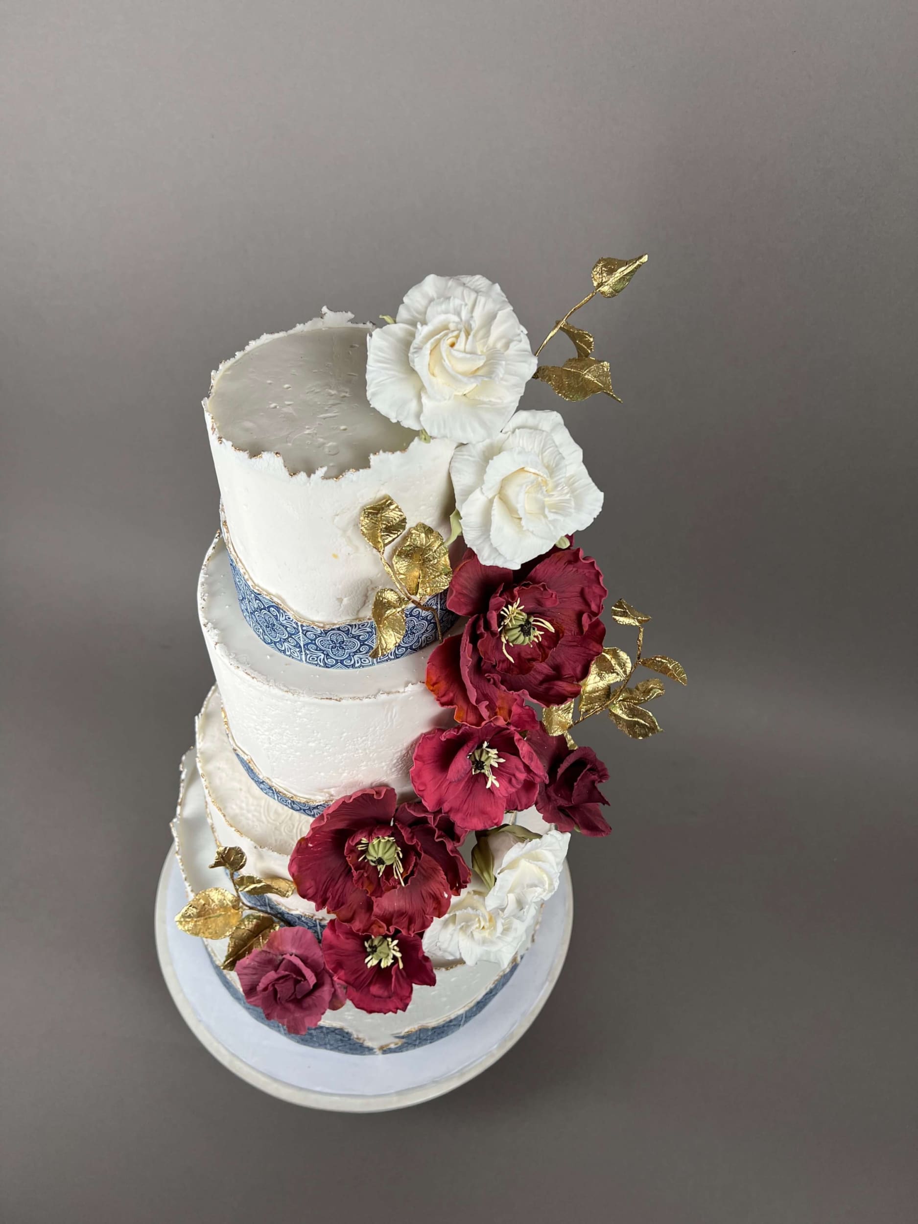 Mediterranean tiles & sugar flowers - wedding cake