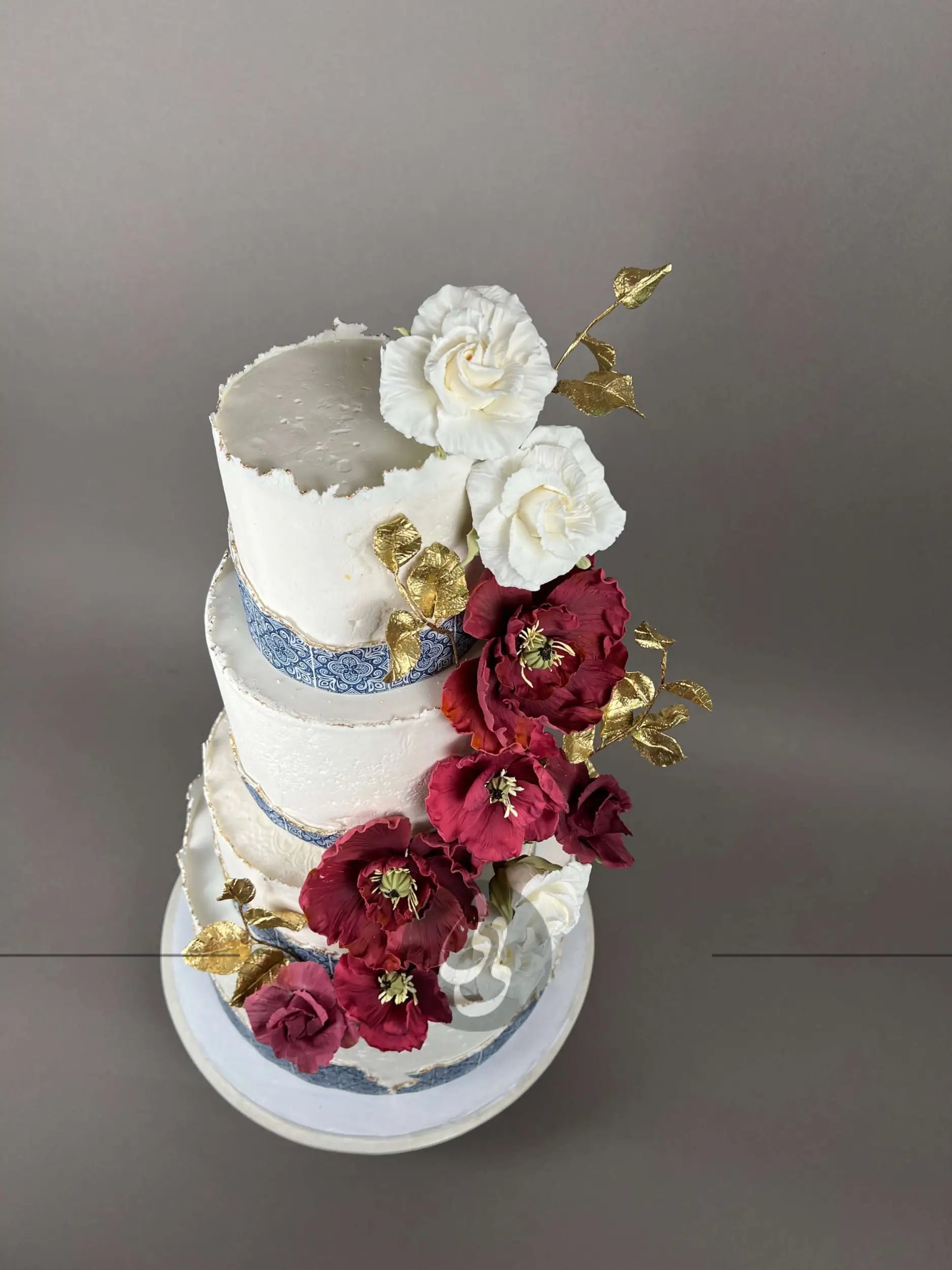 Mediterranean tiles & sugar flowers - wedding cake