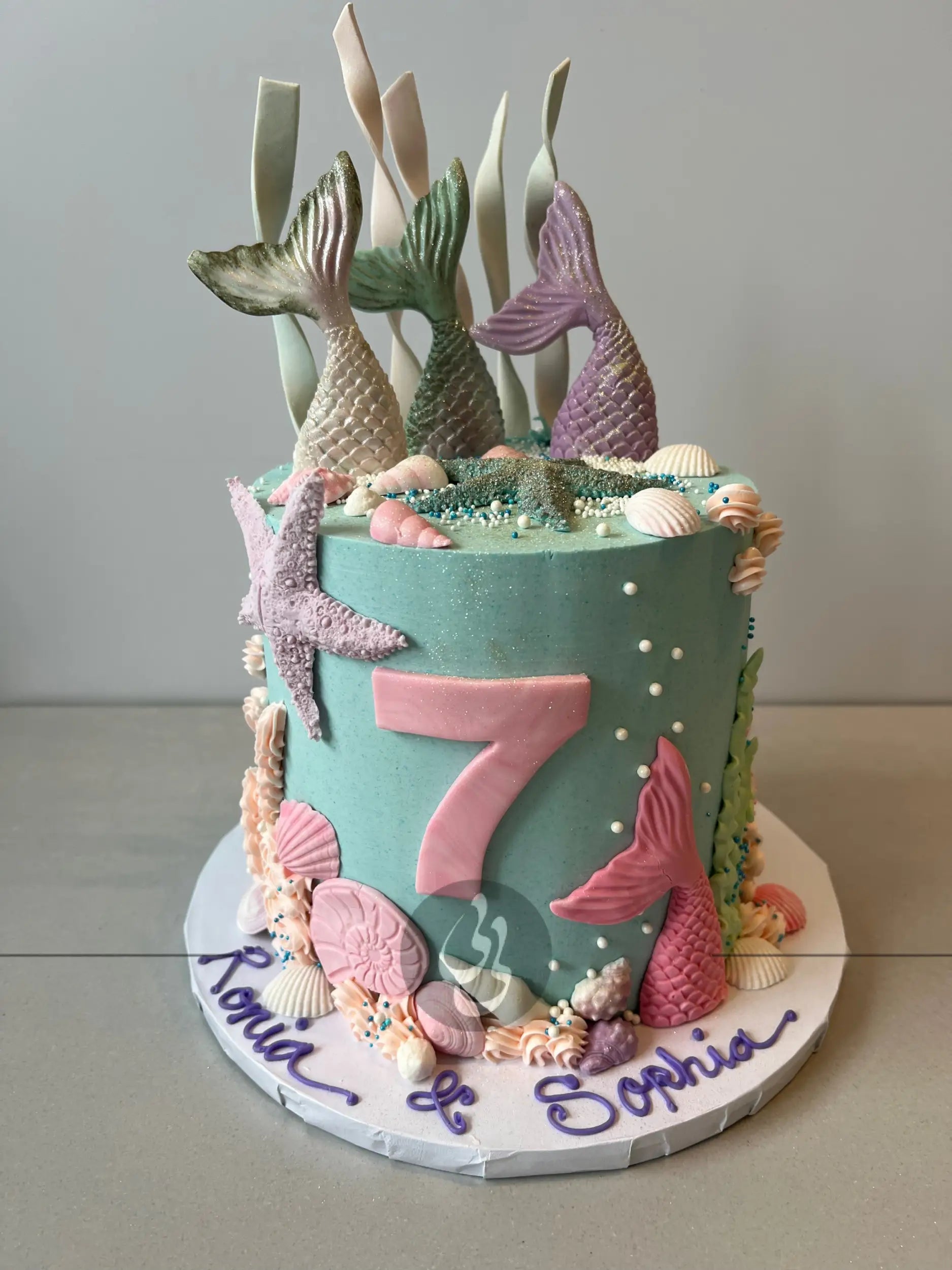 Mermaid tails on buttercream - custom cake