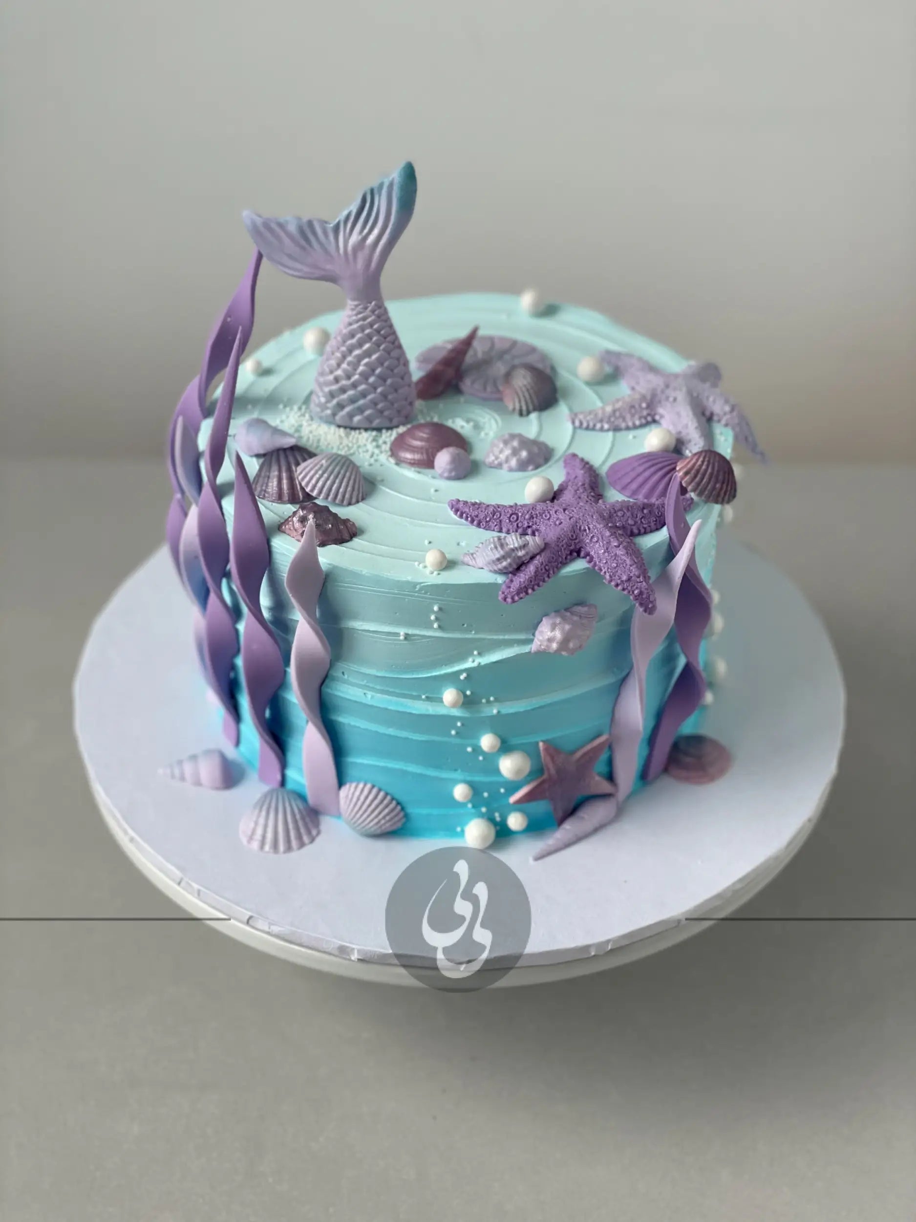 Mermaid tails on buttercream - custom cake