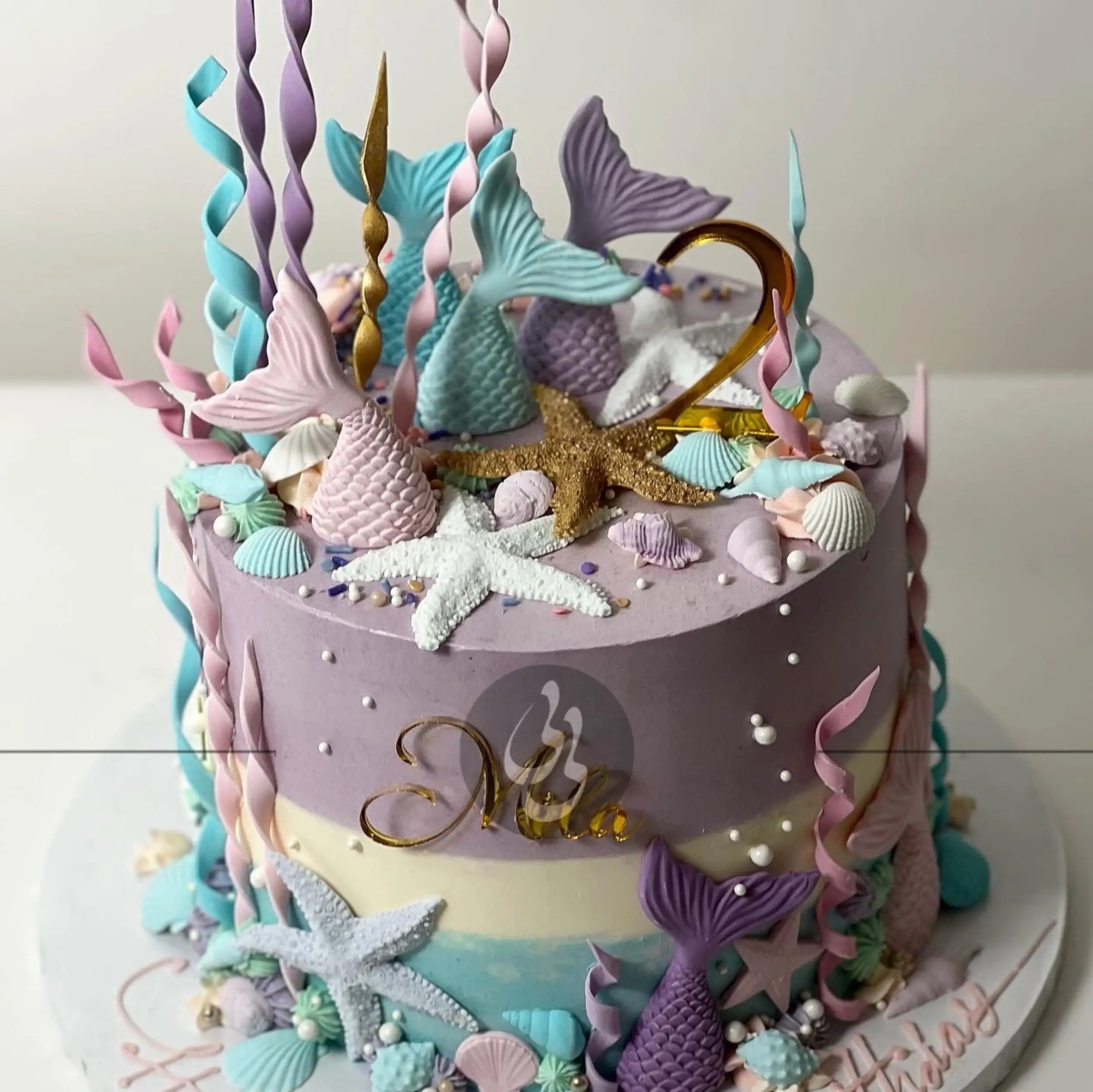 Mermaid tails on buttercream - custom cake