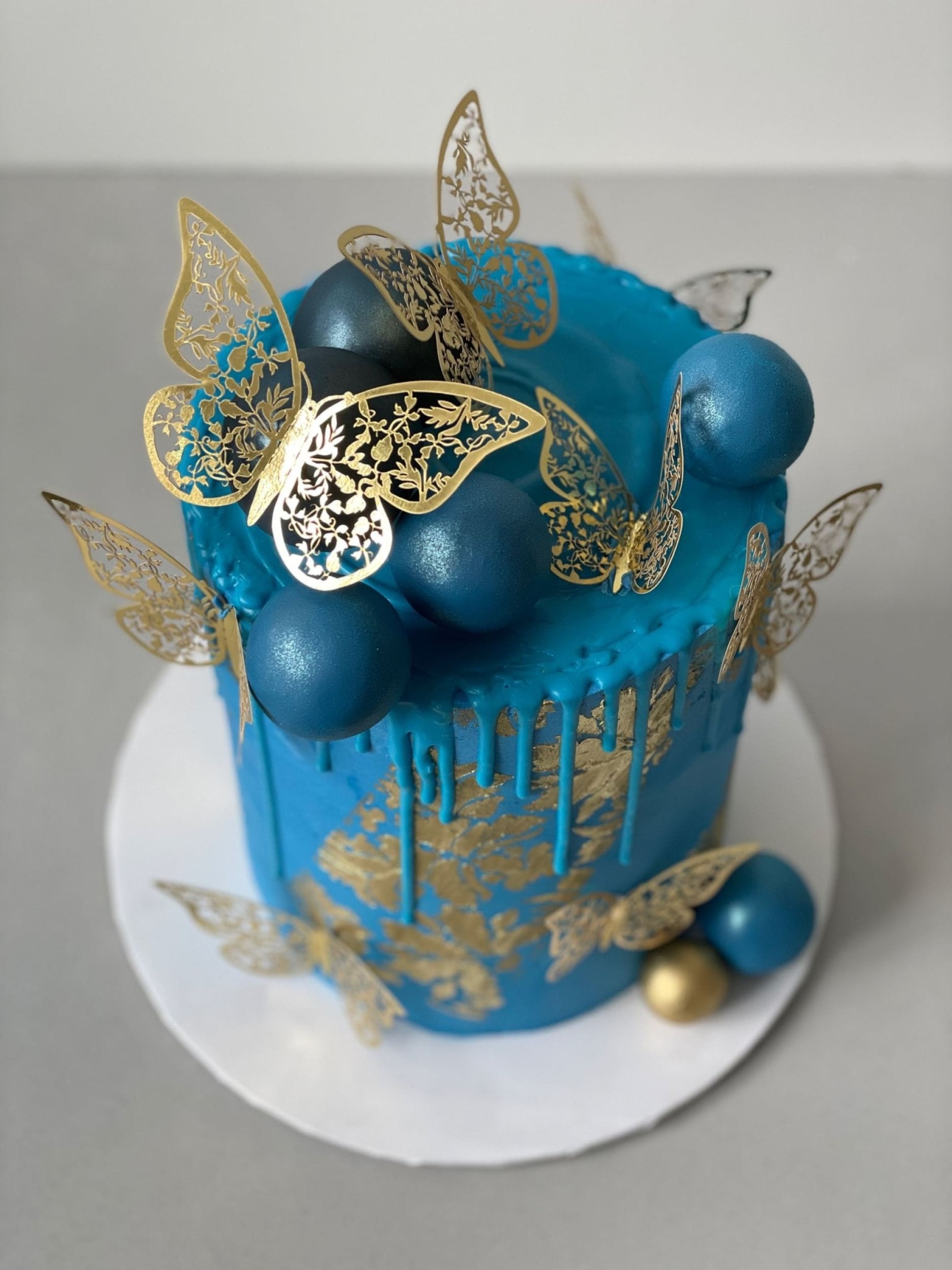 Metallic butterflies & drips on buttercream - custom cake
