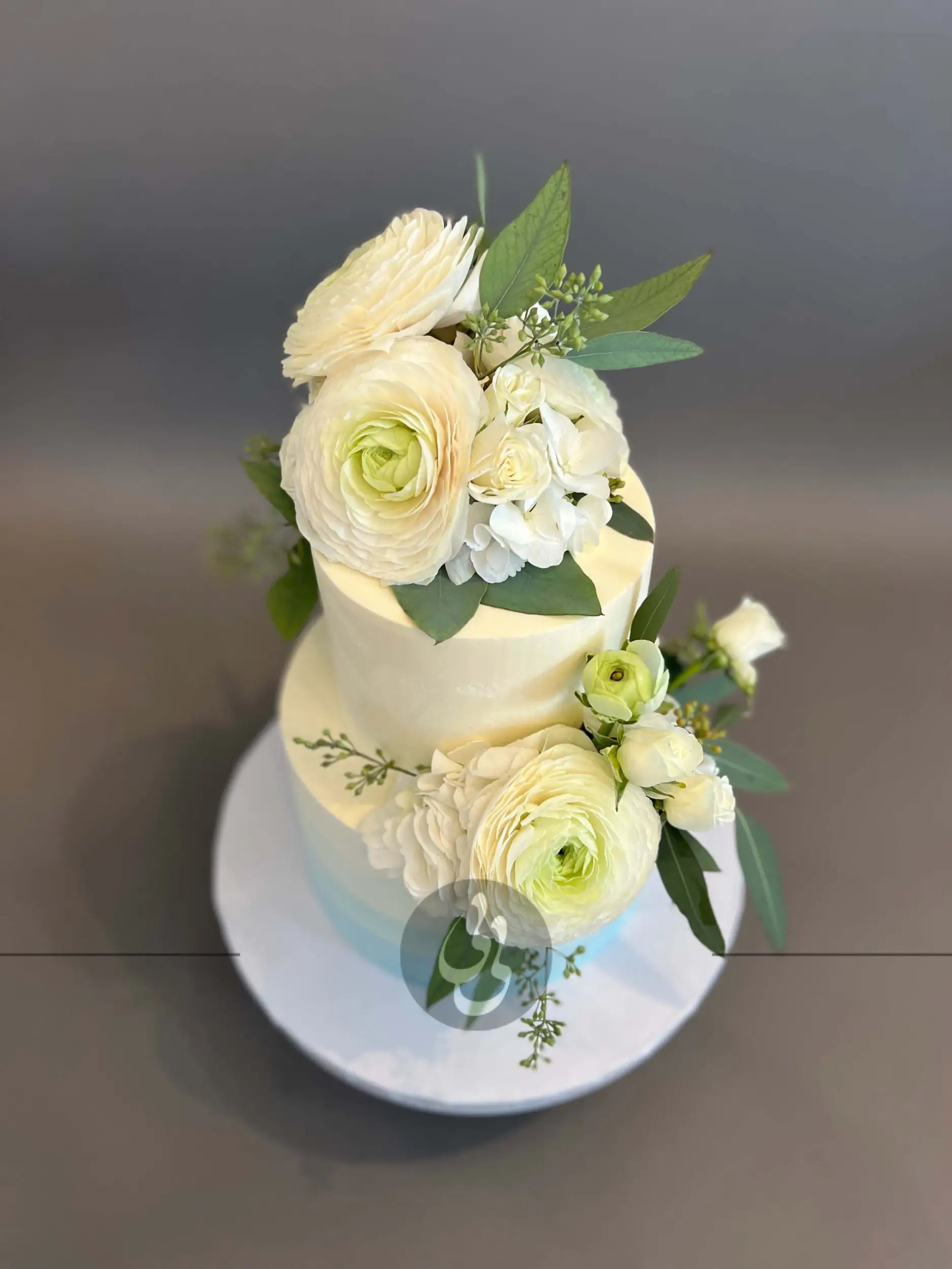 Ombre buttercream & fresh flowers - wedding cake