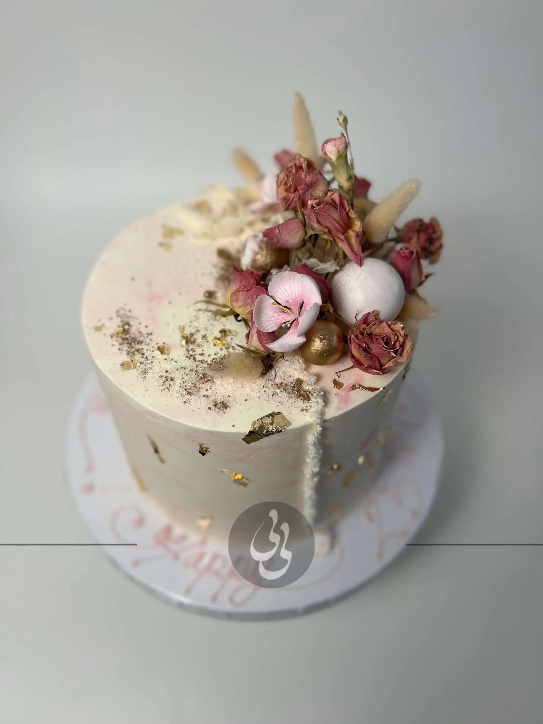 Preserved flowers on marble buttercream - custom cake