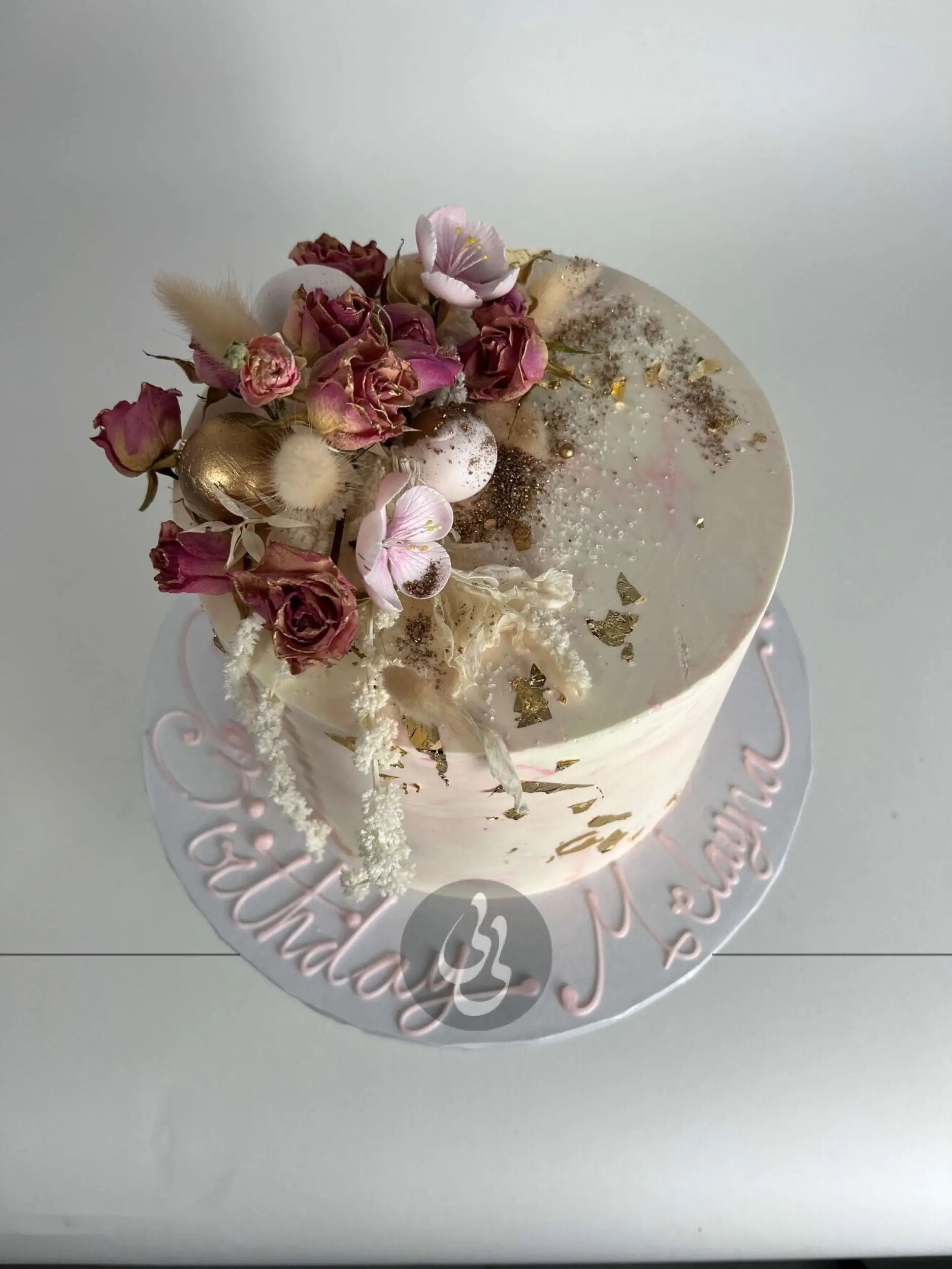 Preserved flowers on marble buttercream - custom cake