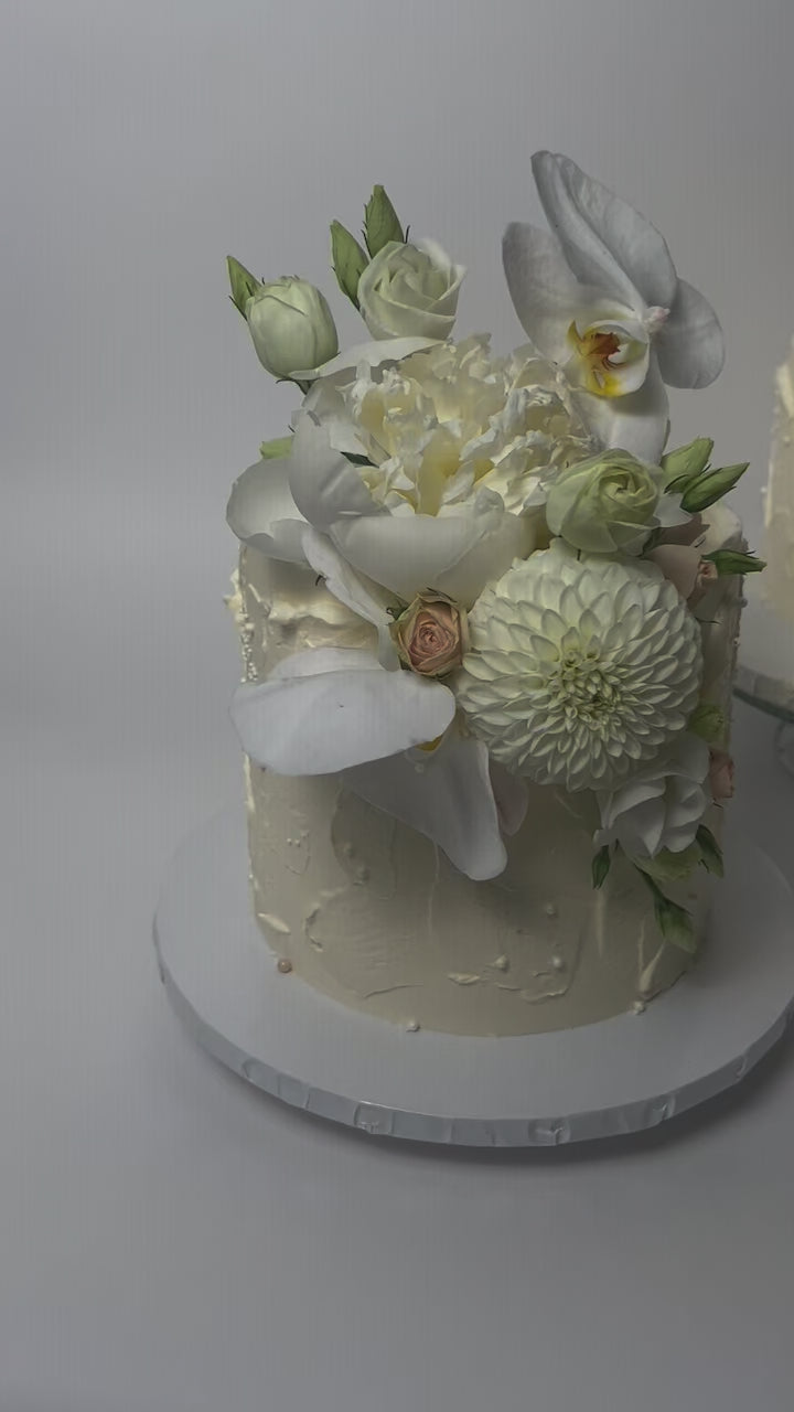 Cascading Fresh Blooms on Buttercream