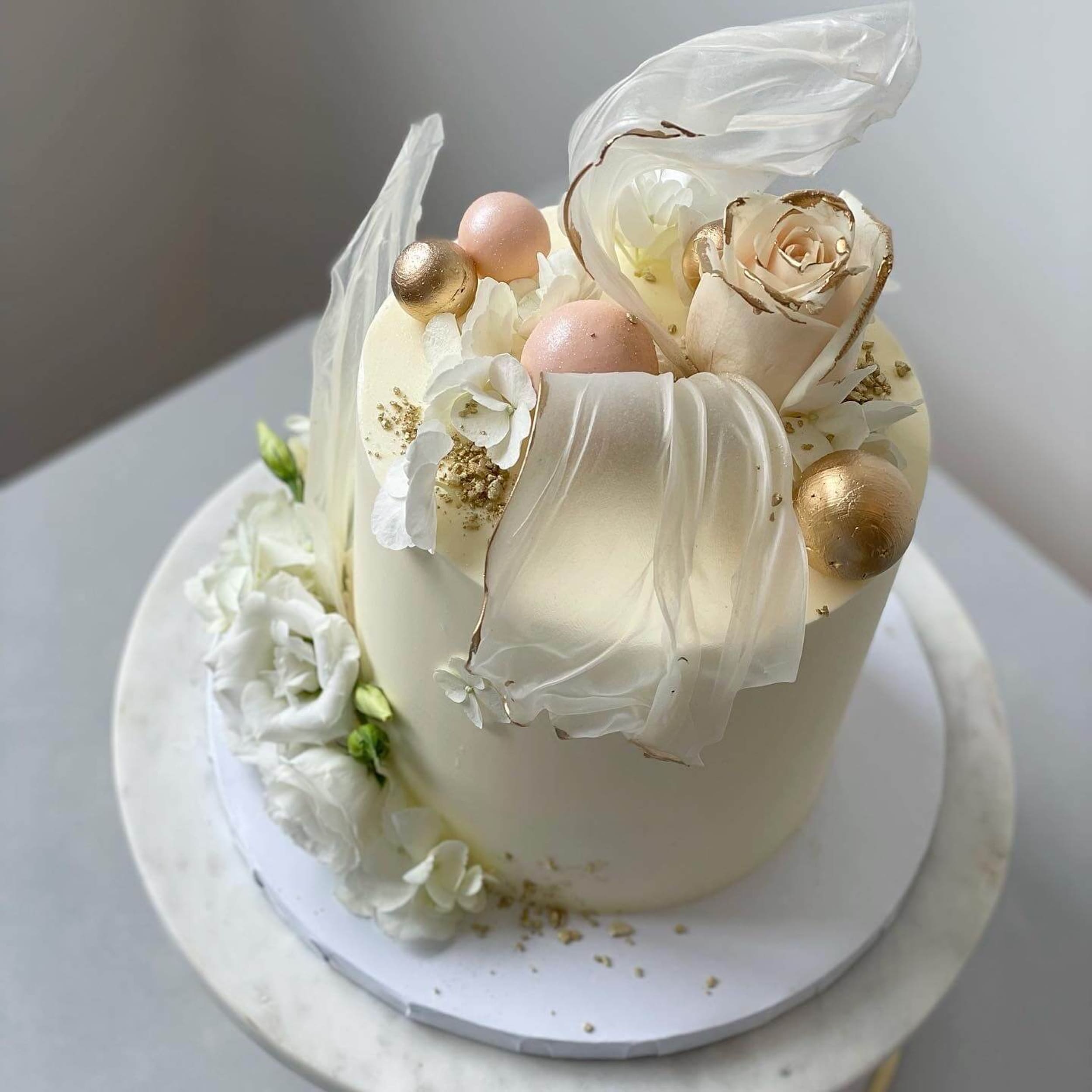 Rice paper sails floral on buttercream - custom cake