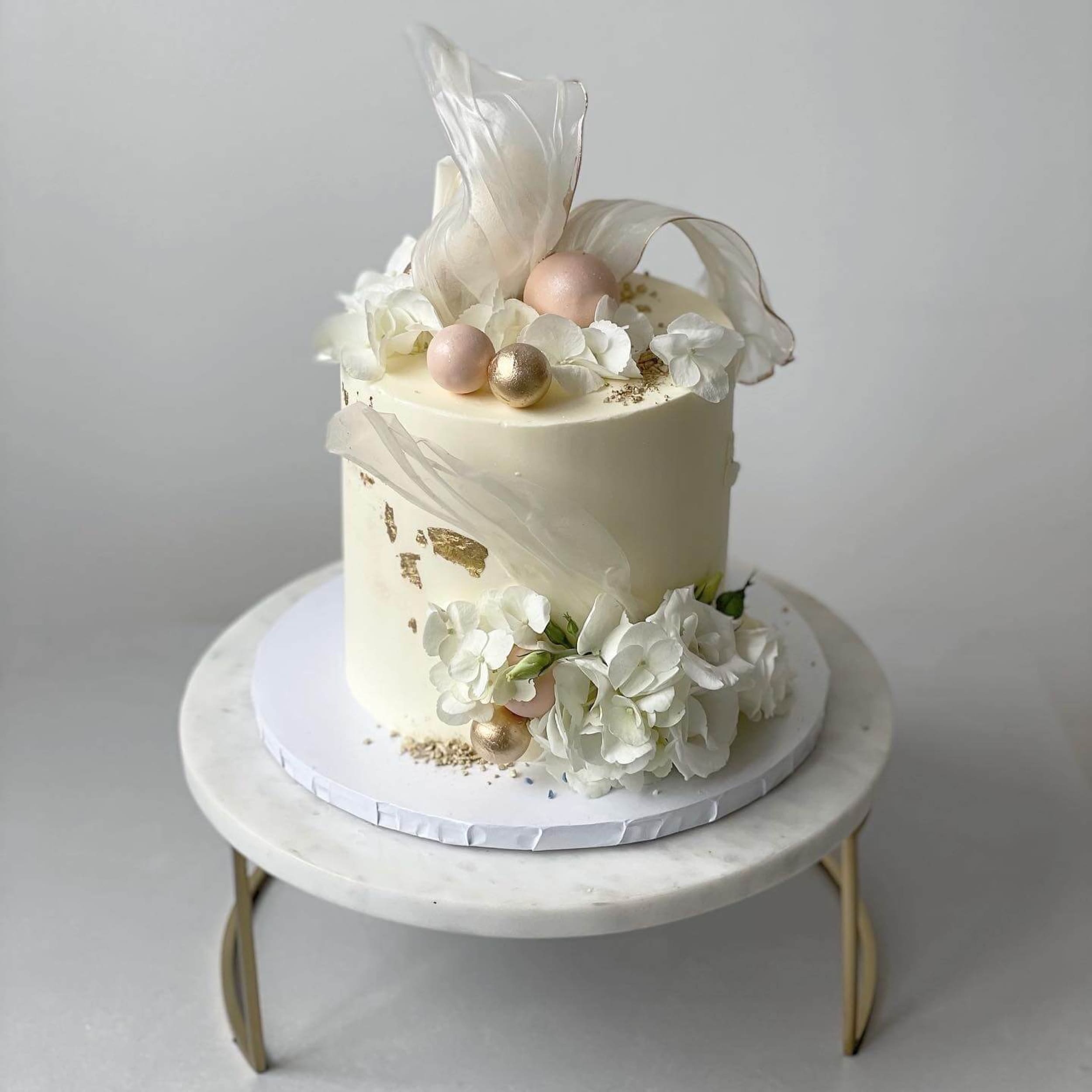 Rice paper sails floral on buttercream - custom cake