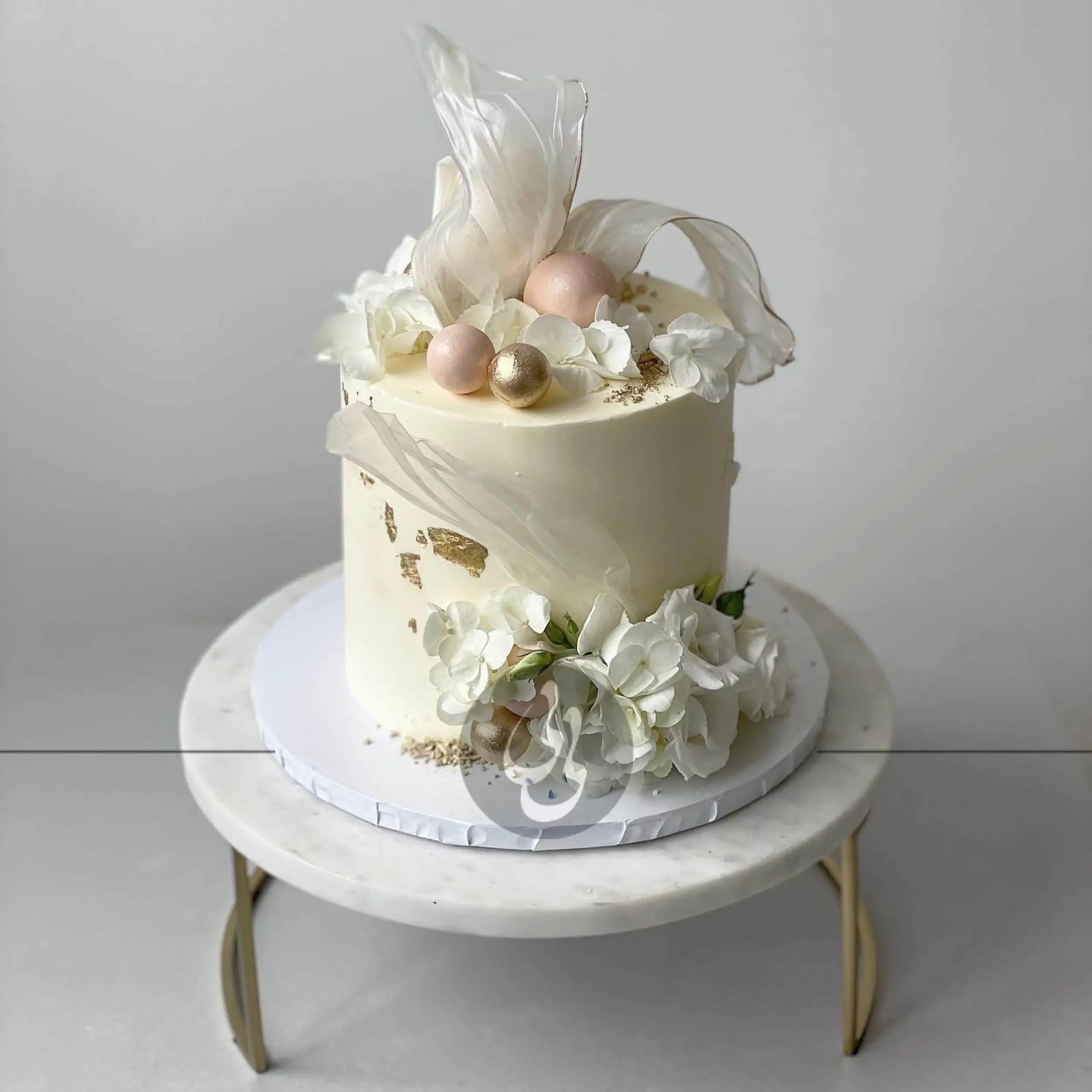 Rice paper sails floral on buttercream - custom cake