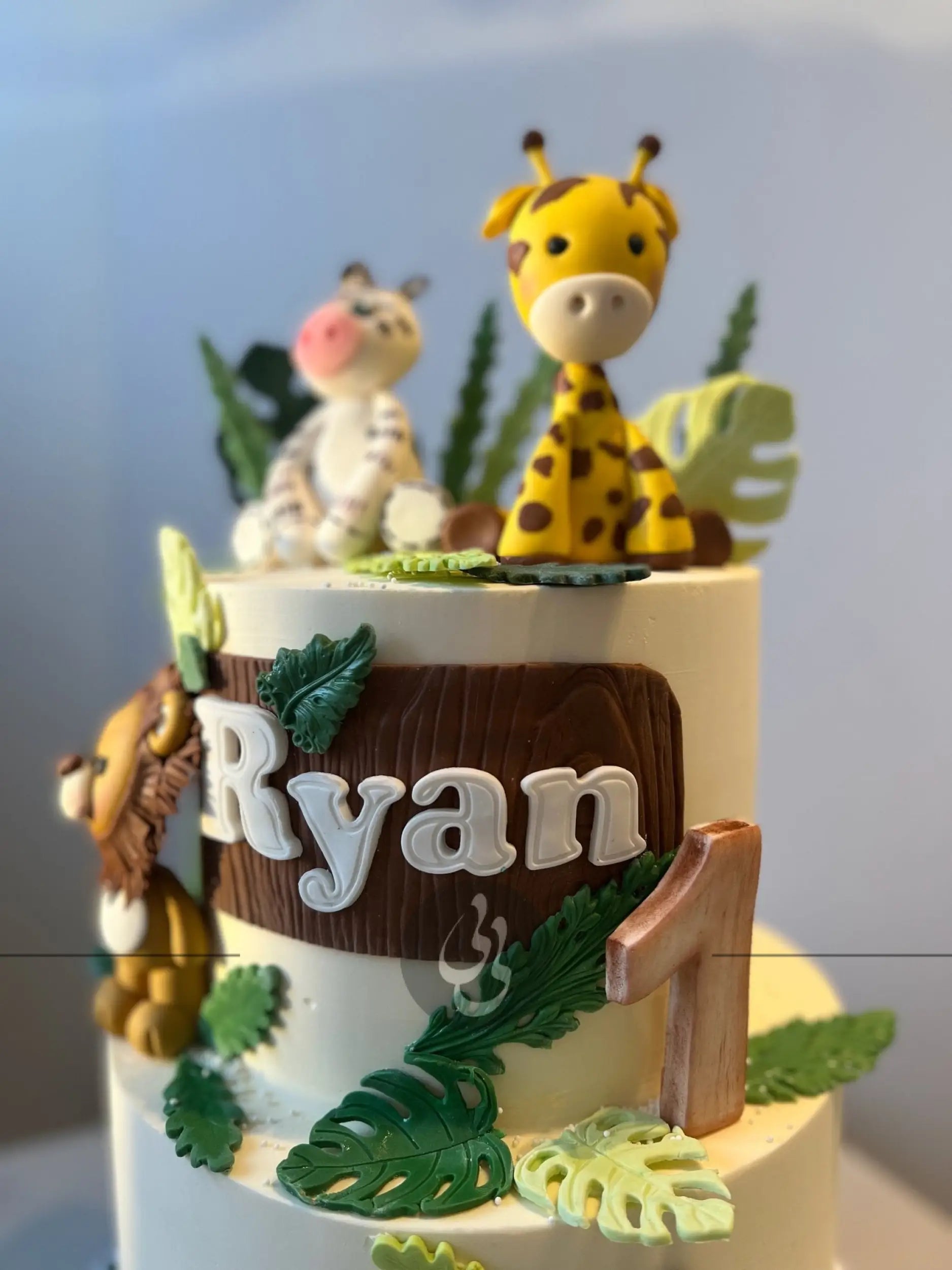 Safari animals & leaves - custom cake