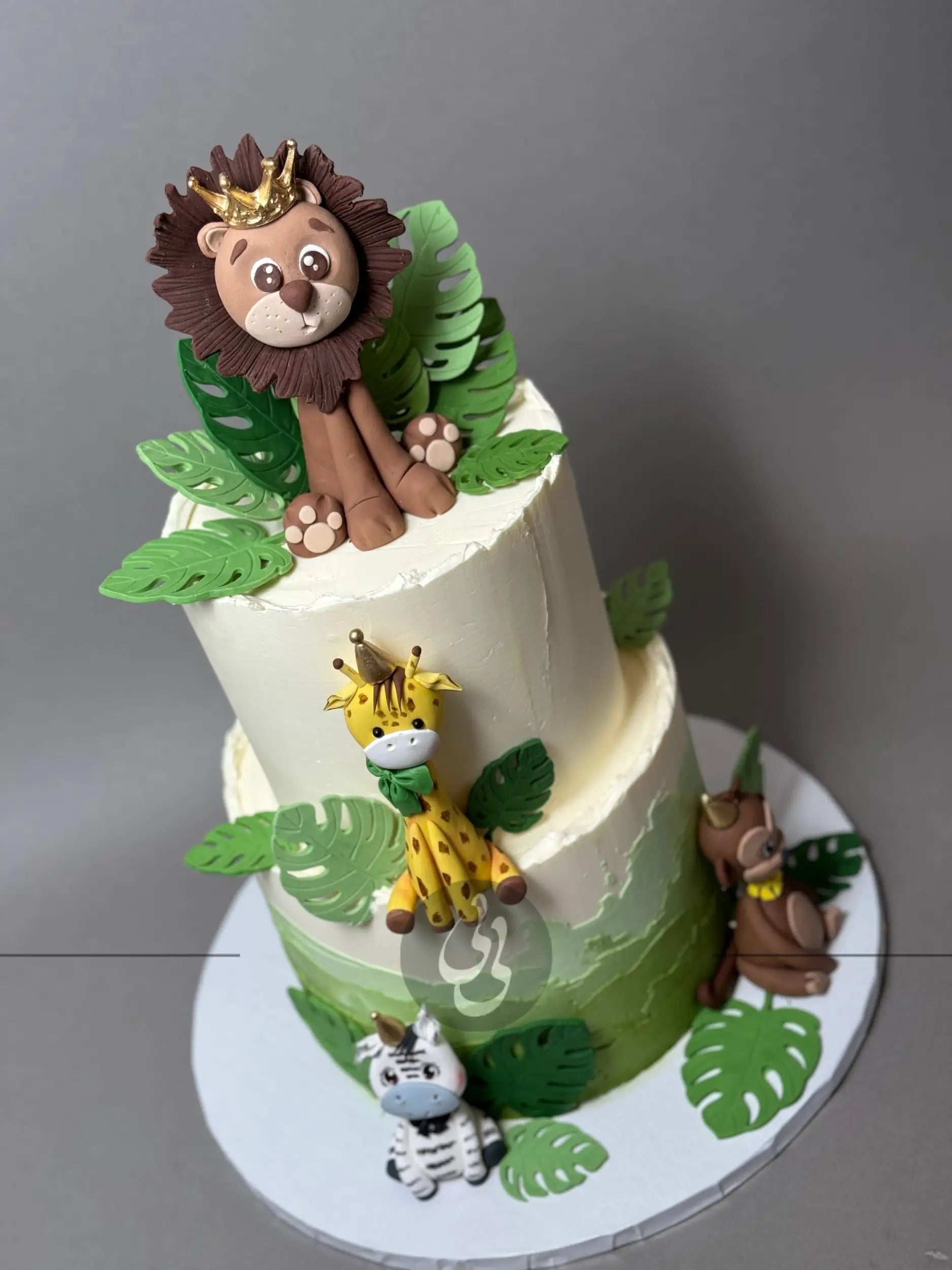 Safari animals & leaves - custom cake