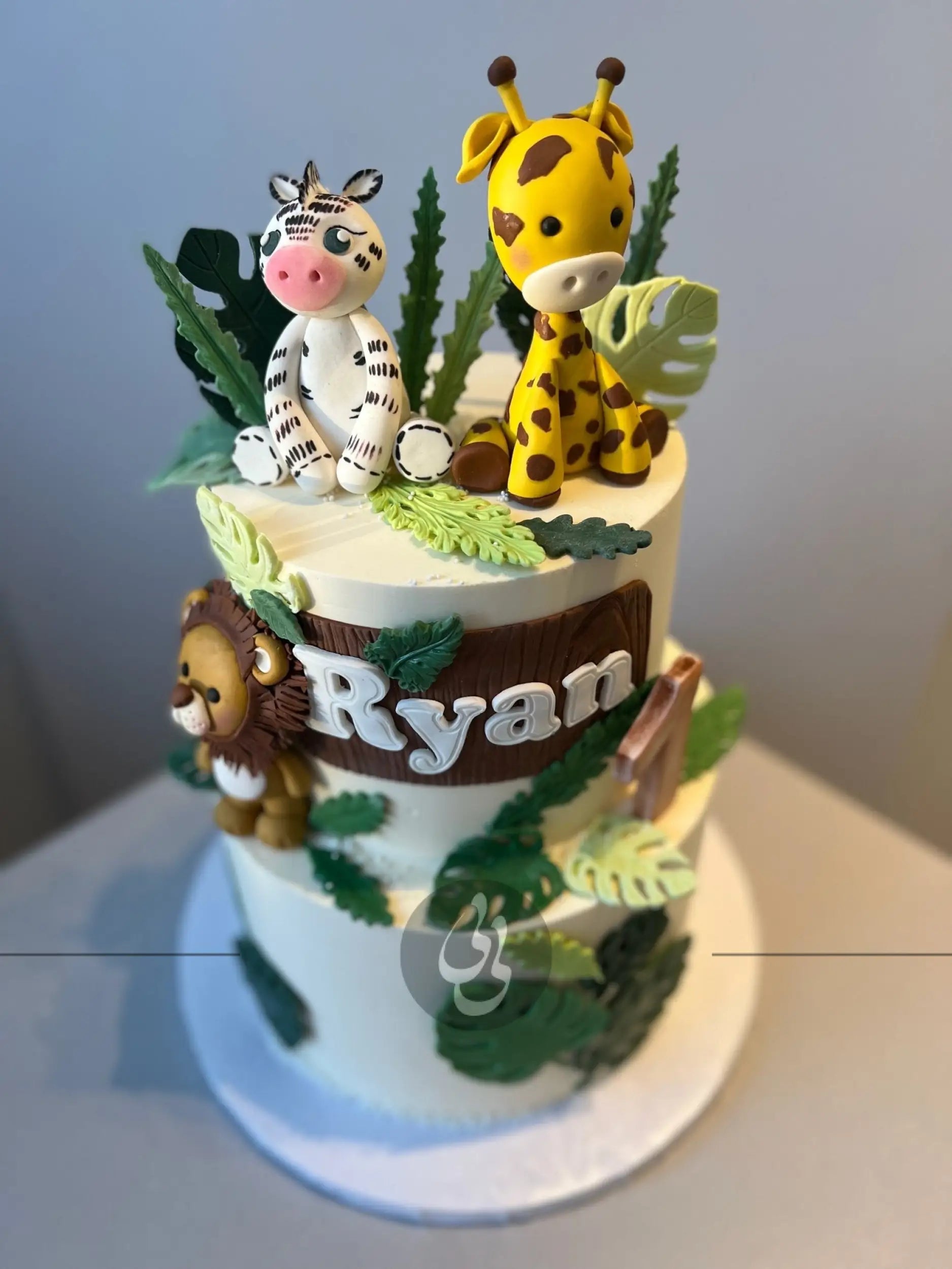 Safari animals & leaves - custom cake
