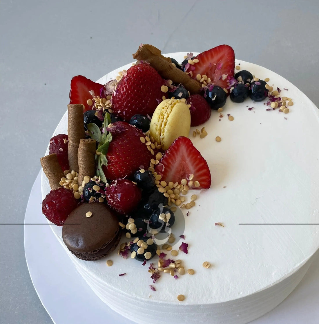 Seasonal fruits on whipped cream - custom cake