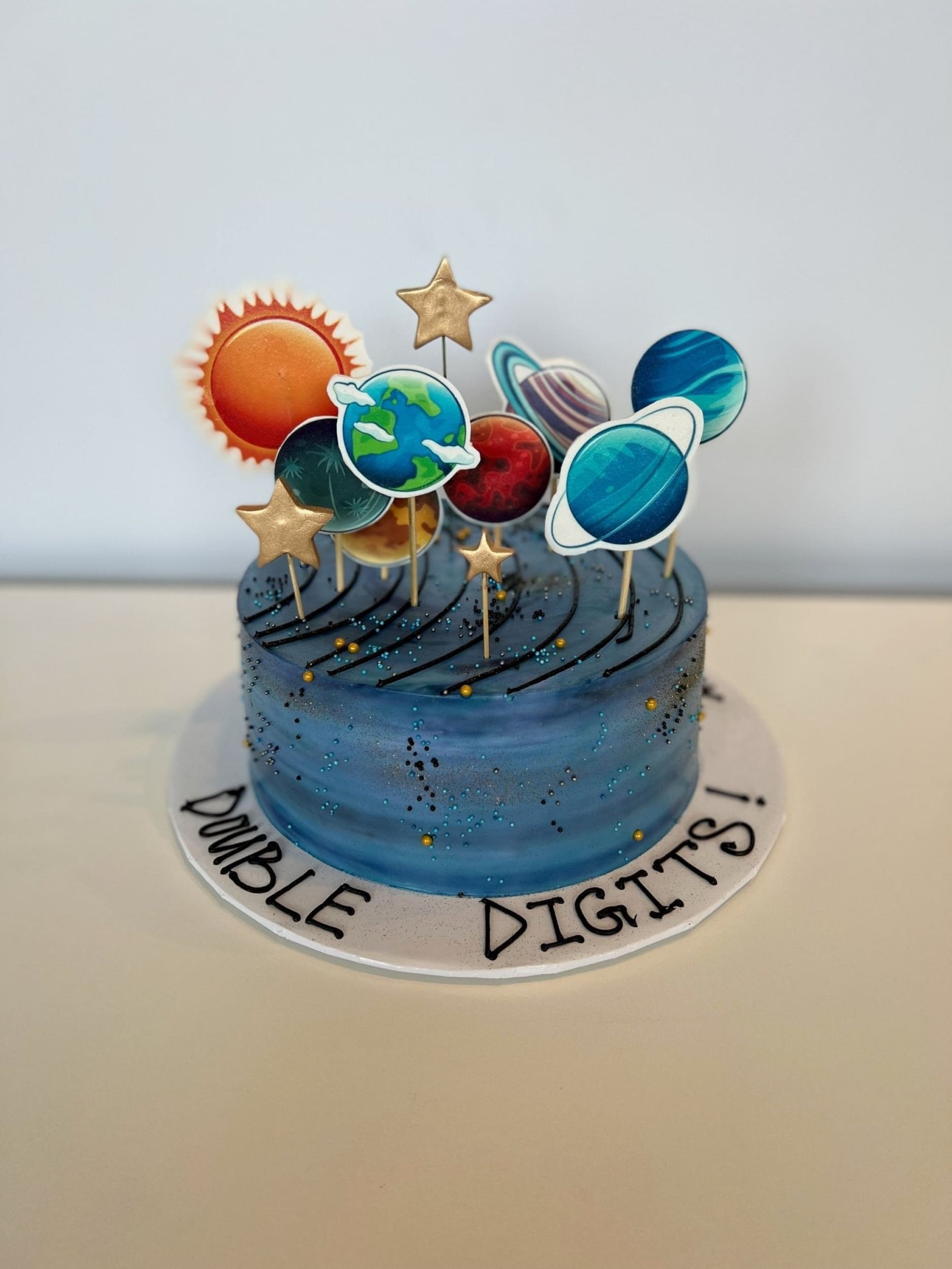 Solar system edible print on whipped cream - custom cake