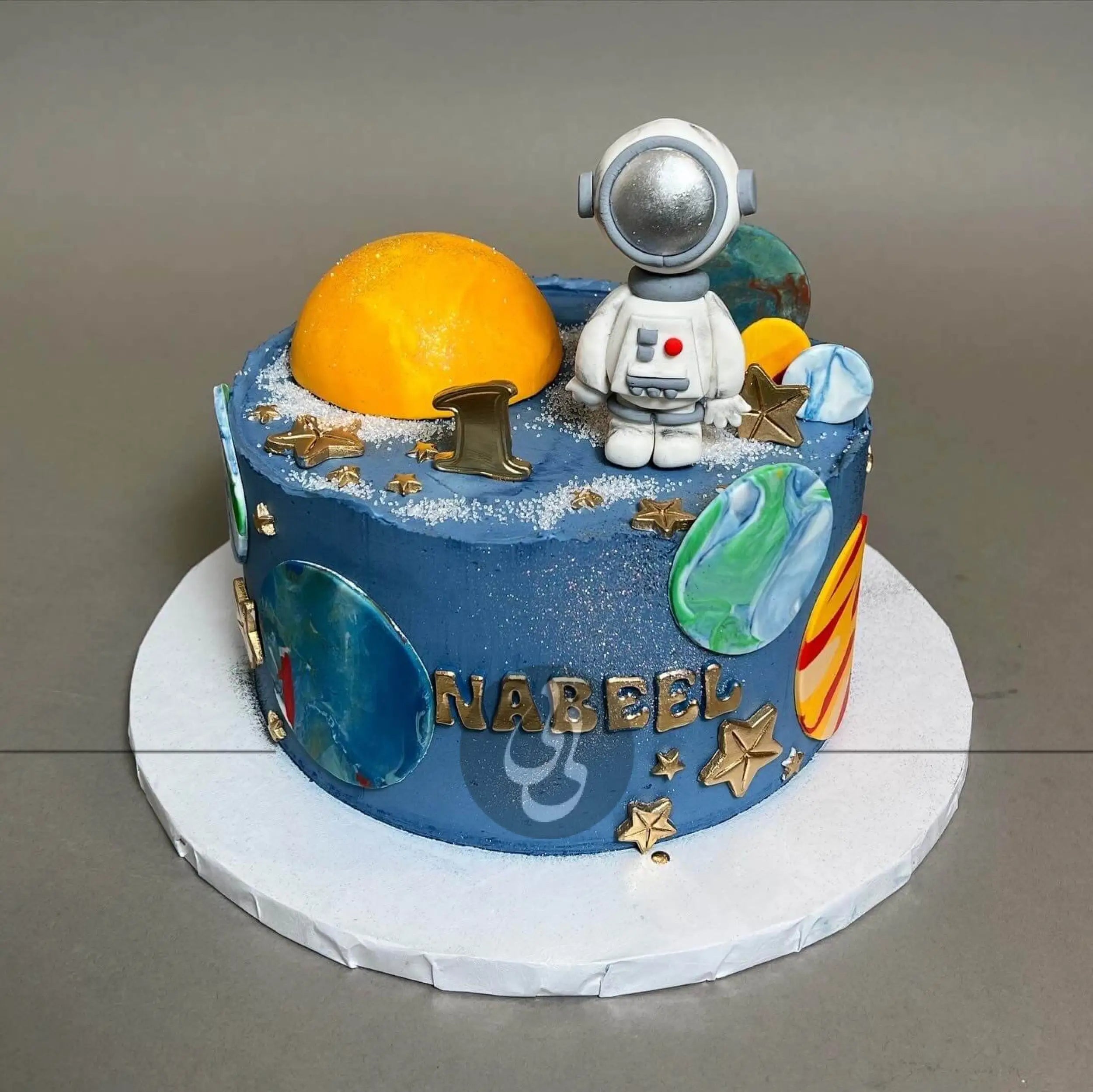 Space astronaut & planets on buttercream - custom cake