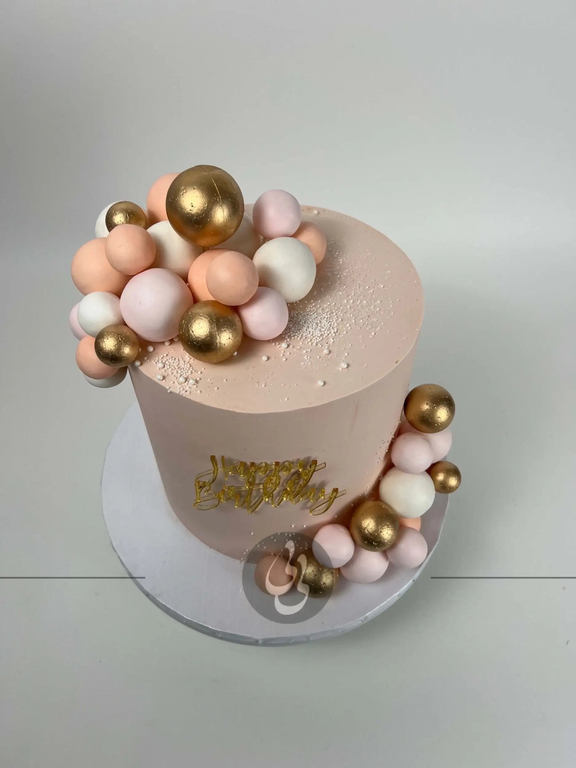 Spheres on buttercream - custom cake