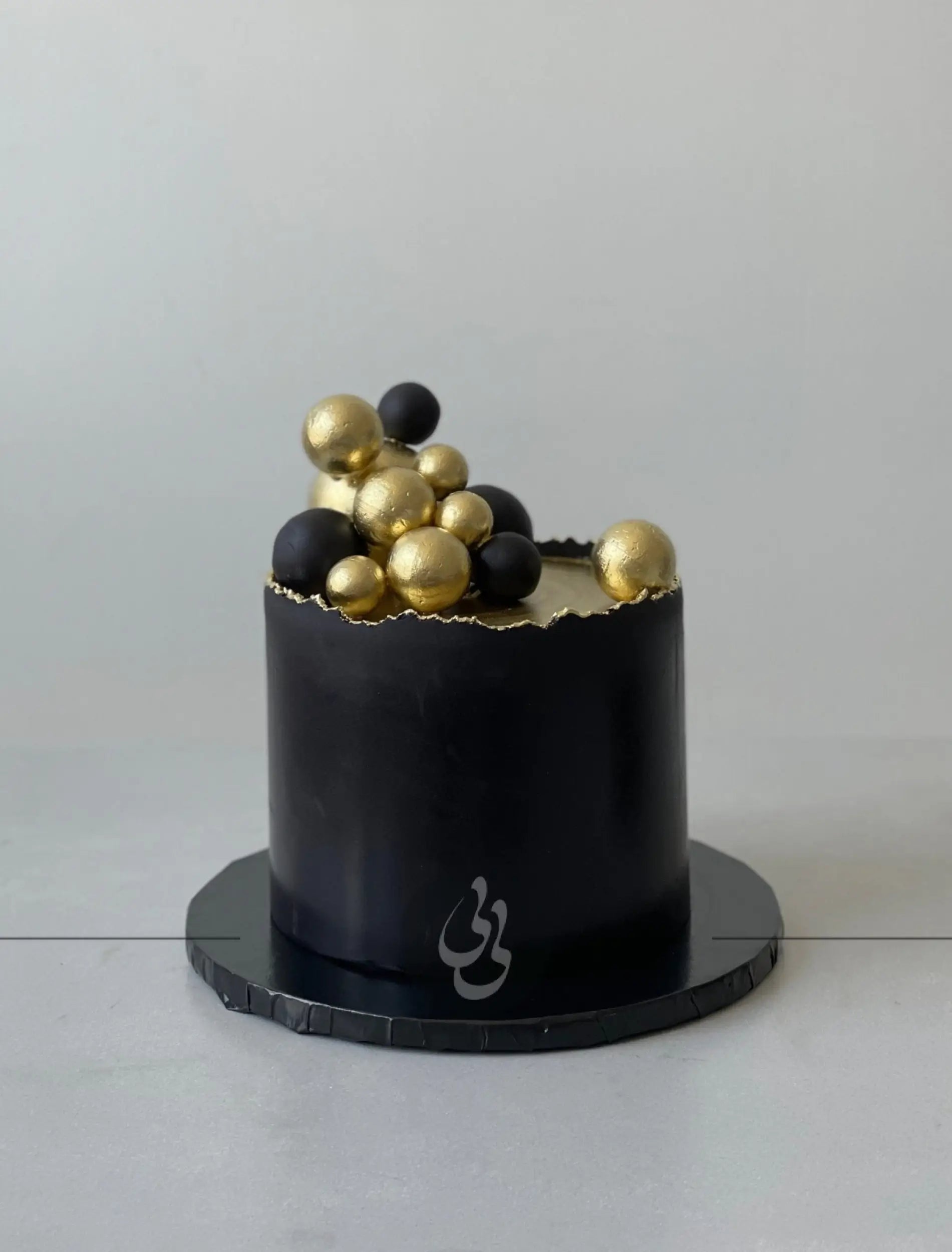 Spheres on deckled edge fondant - custom cake