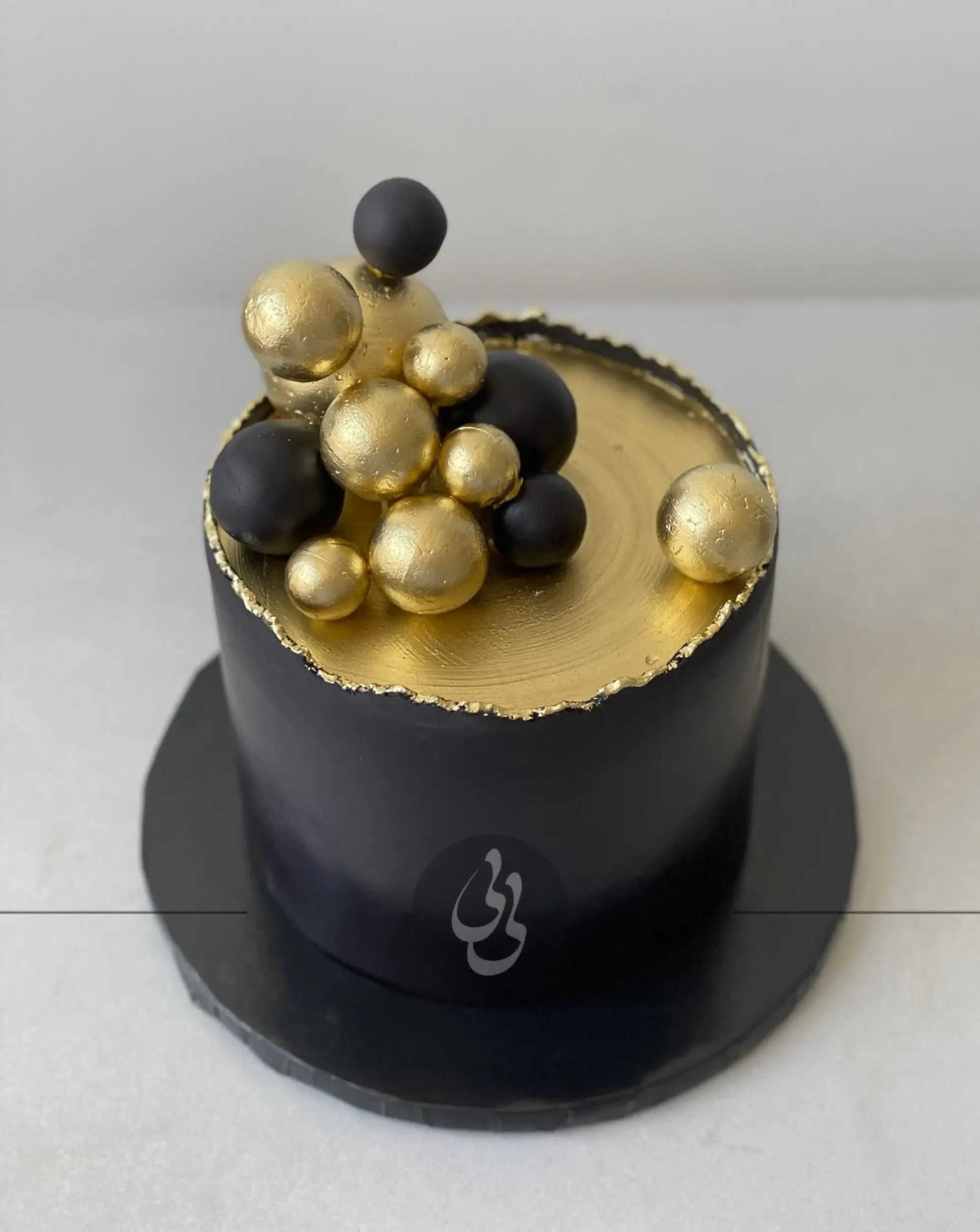 Spheres on deckled edge fondant - custom cake