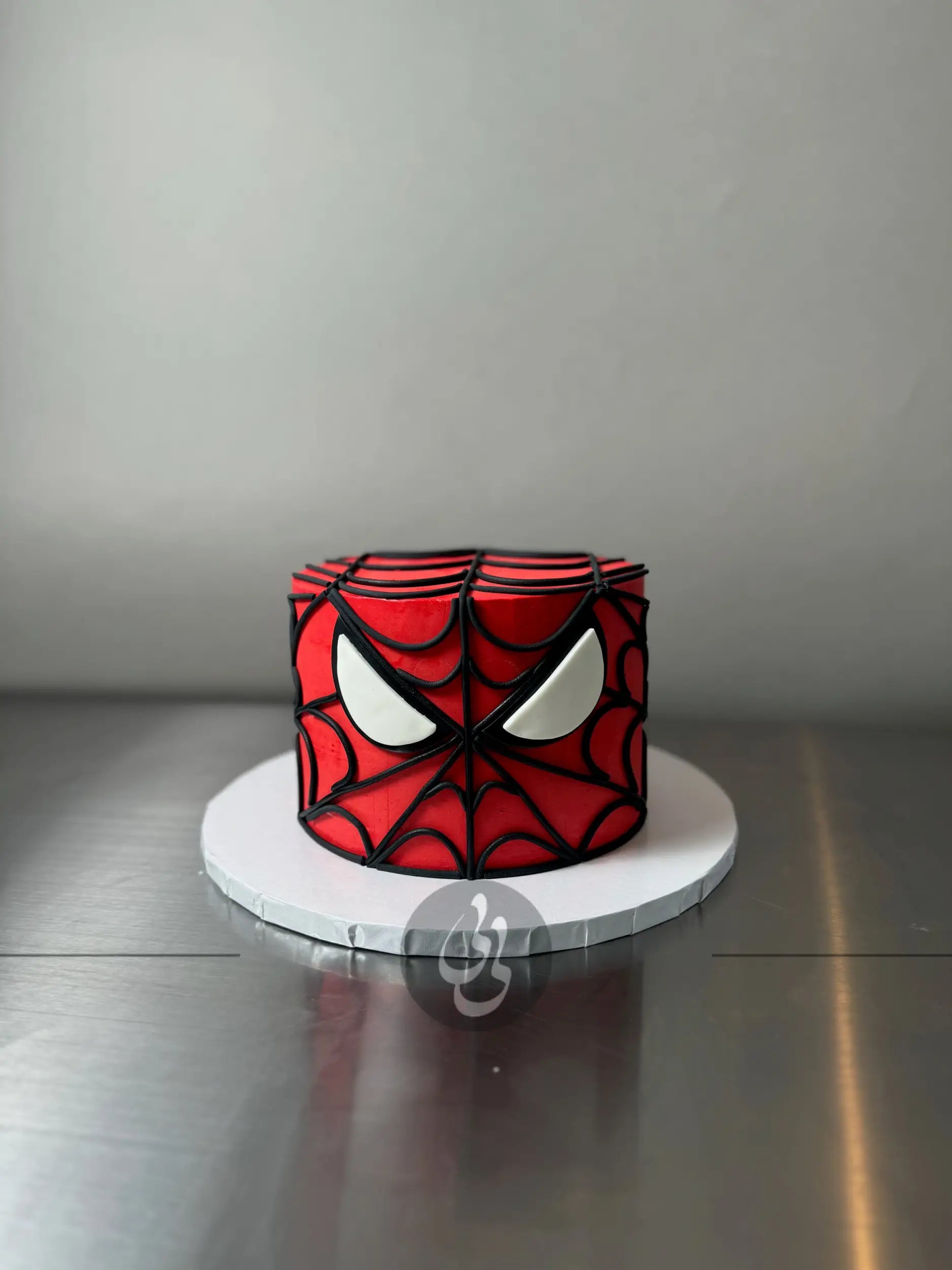 Spiderman face on buttercream - custom cake