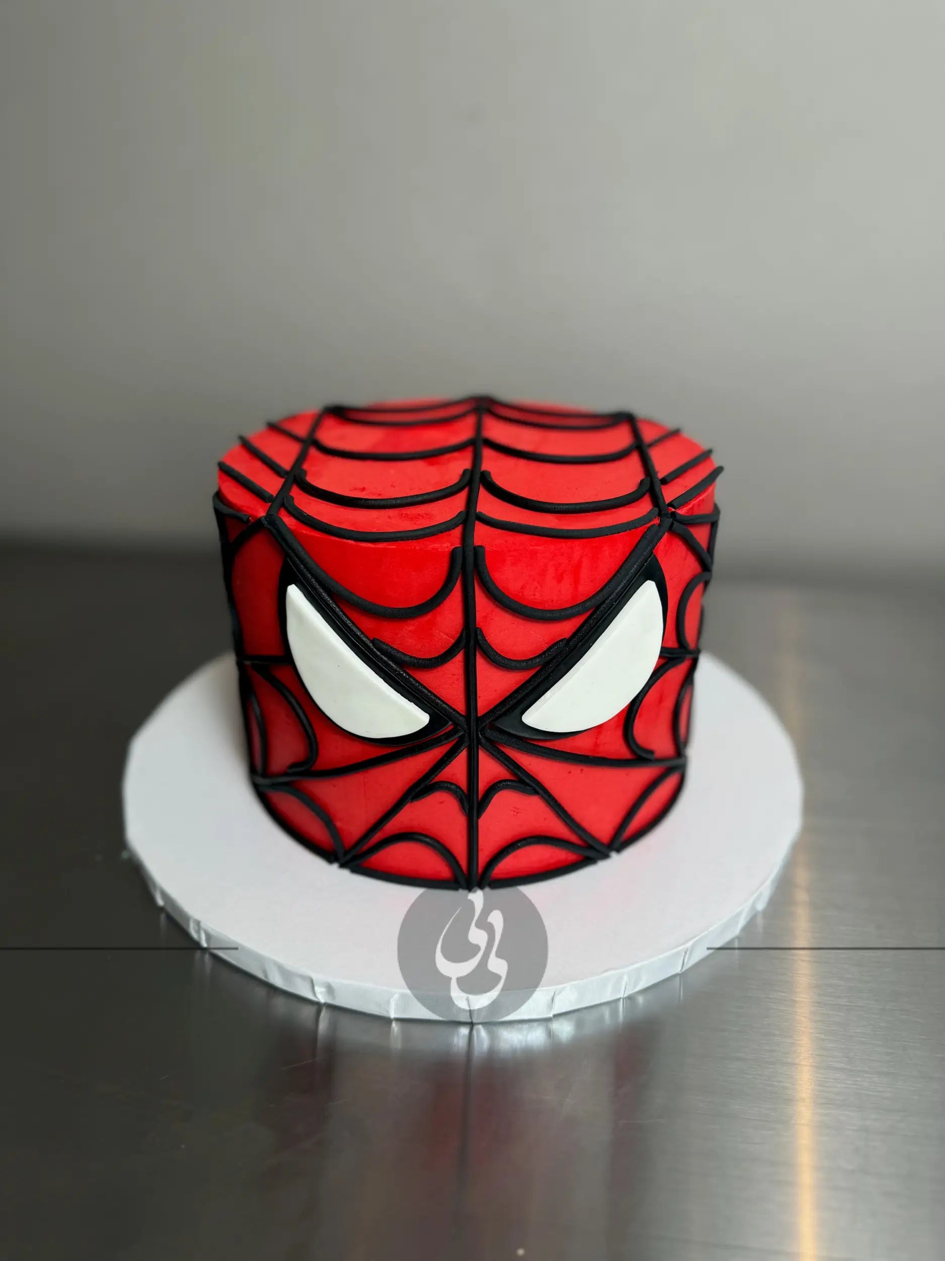 Spiderman face on buttercream - custom cake