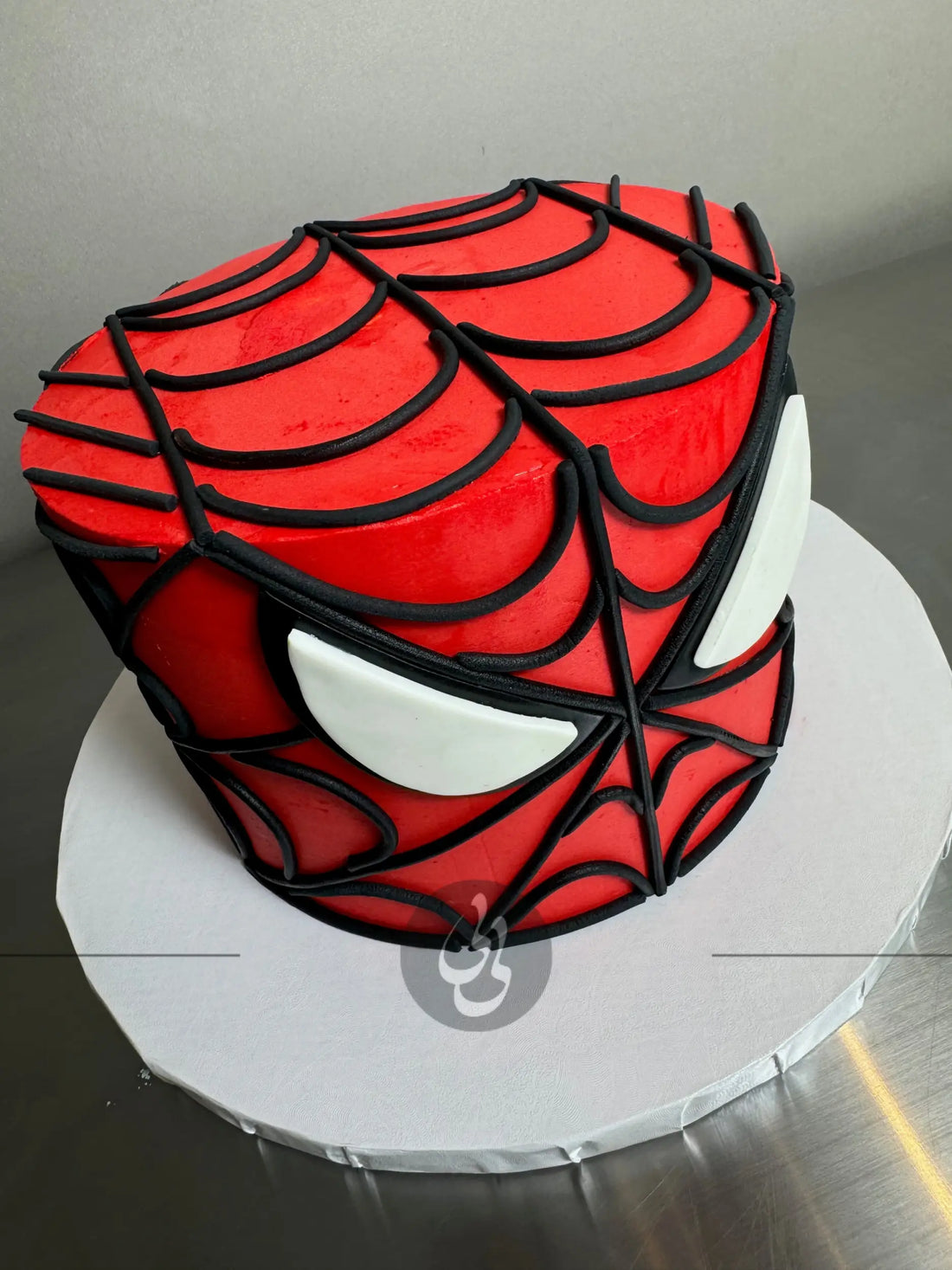 Spiderman face on buttercream - custom cake