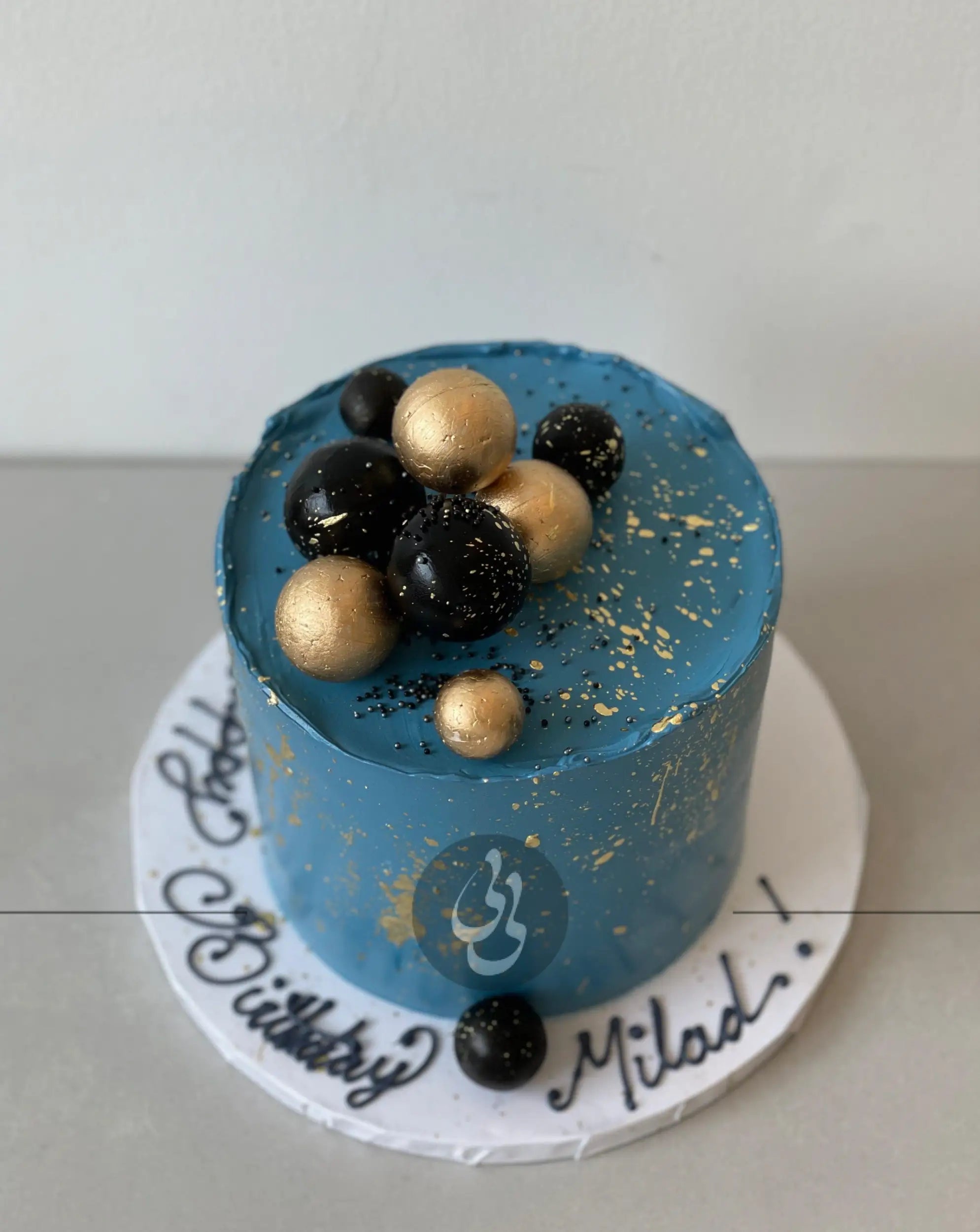 Splashed & textured spheres on buttercream - custom cake